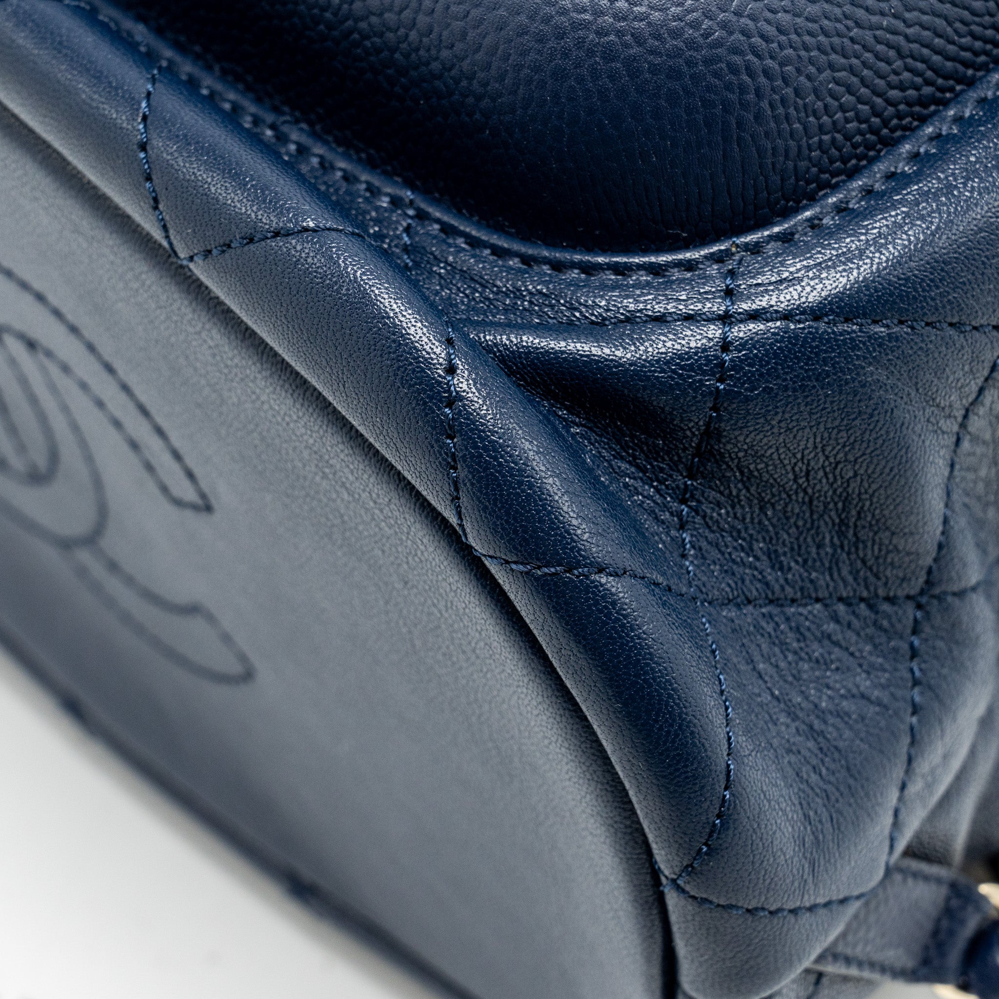 CHANEL DRAWSTRING BACKPACK LAMBSKIN/GRAINED CALFSKIN DARK BLUE LGHW