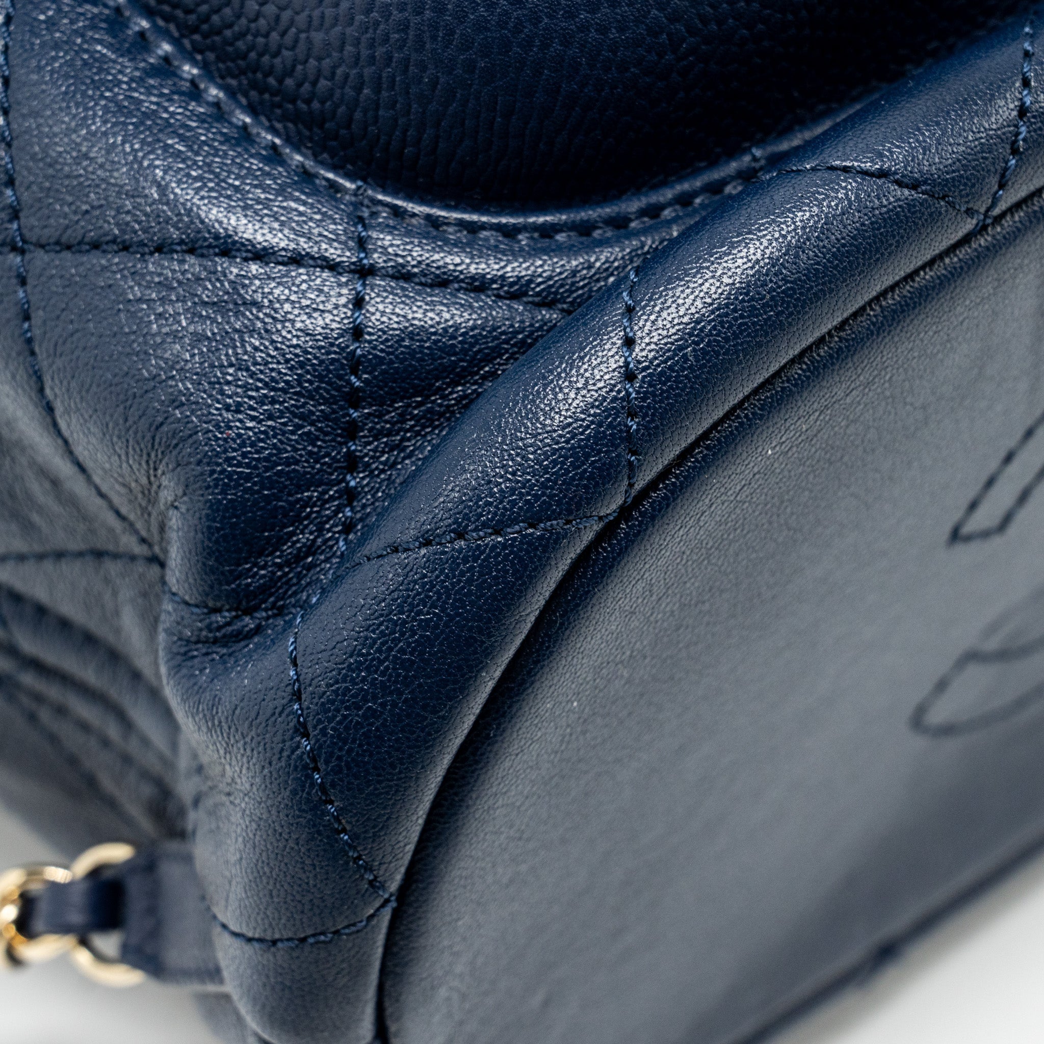 CHANEL DRAWSTRING BACKPACK LAMBSKIN/GRAINED CALFSKIN DARK BLUE LGHW
