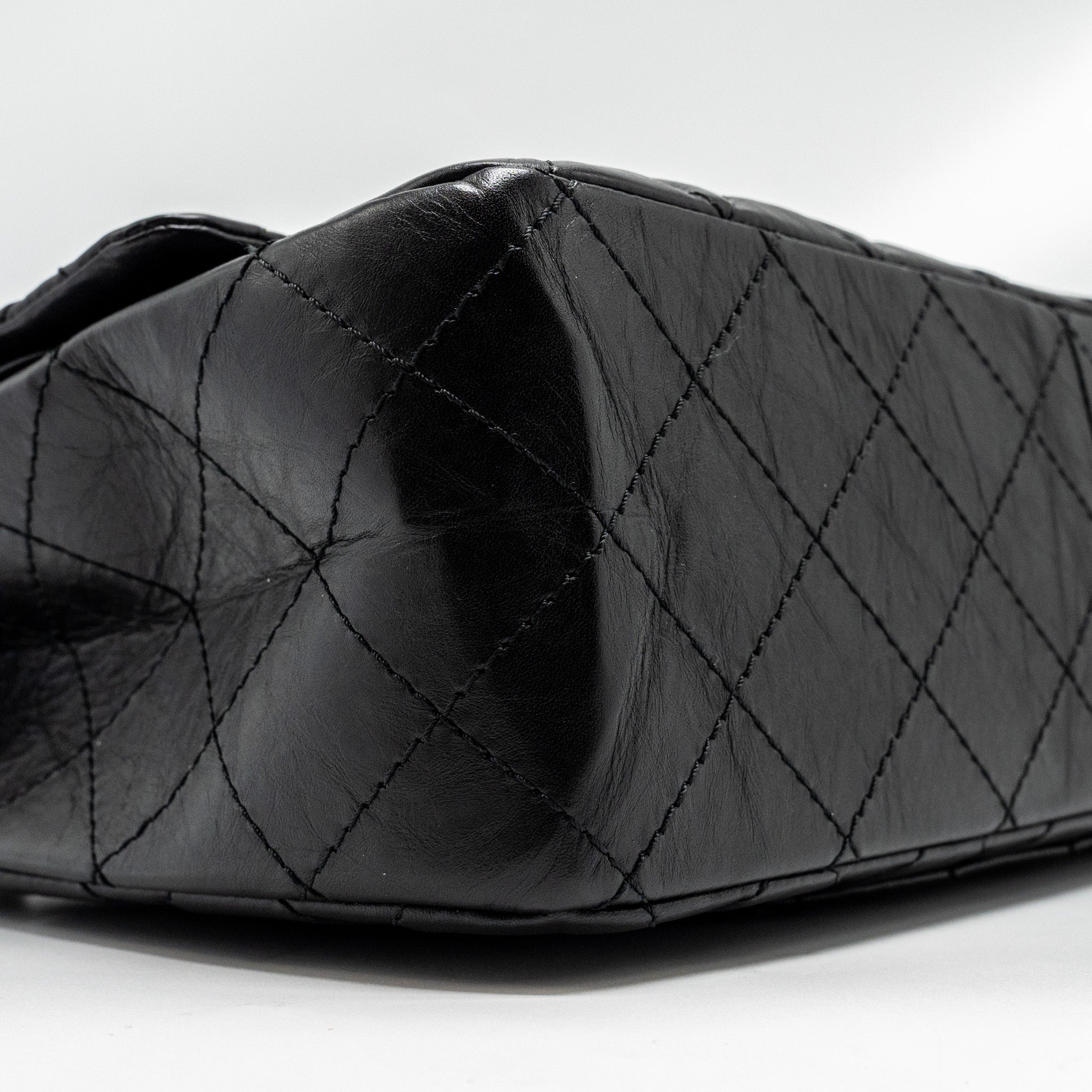 CHANEL MAXI 2.55 REISSUE FLAP BAG AGED CALFSKIN BLACK GHW