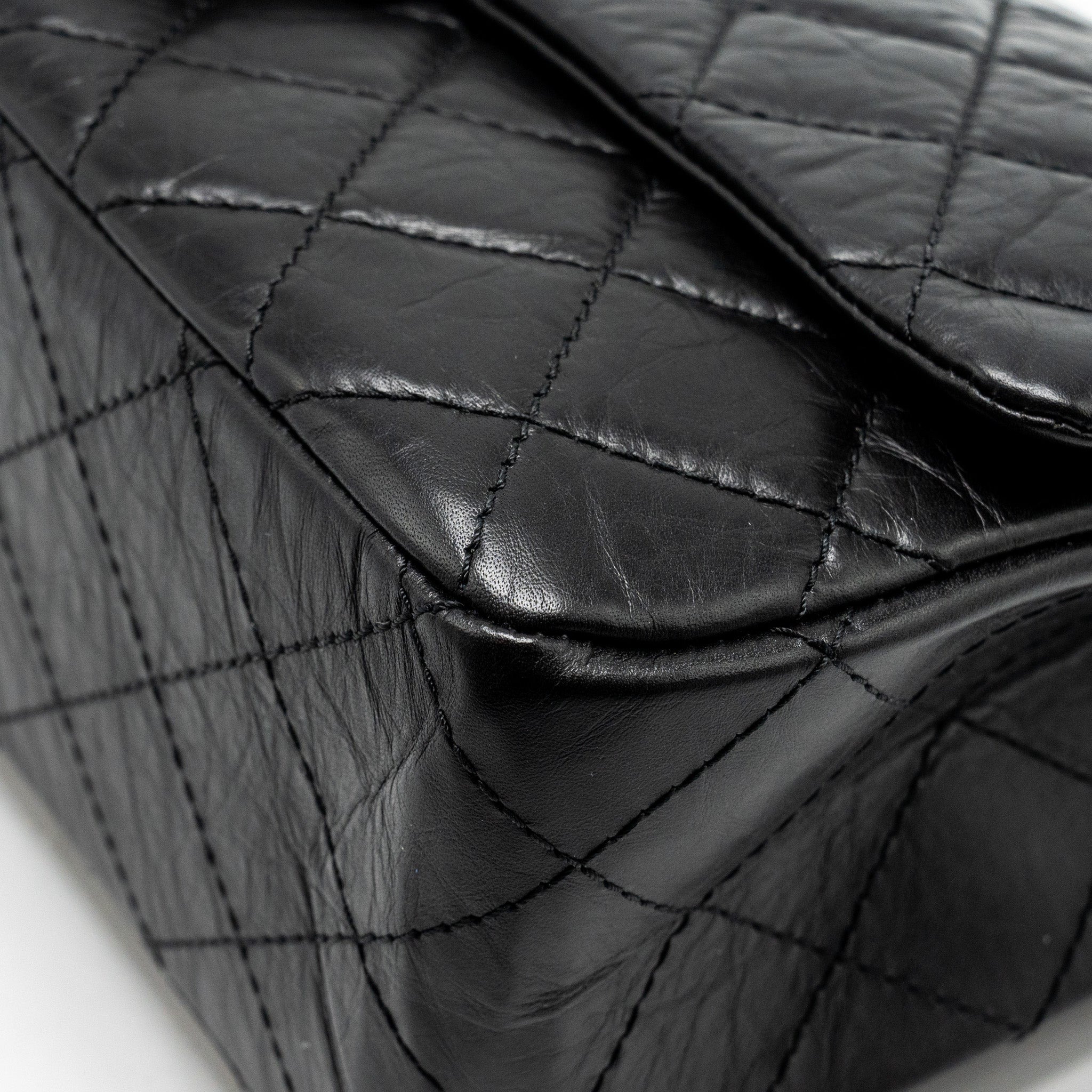 CHANEL MAXI 2.55 REISSUE FLAP BAG AGED CALFSKIN BLACK GHW