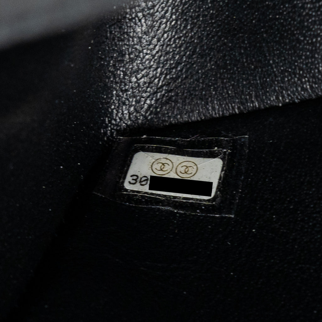 CHANEL MINI 2.55 REISSUE FLAP BAG AGED CALFSKIN BLACK GHW