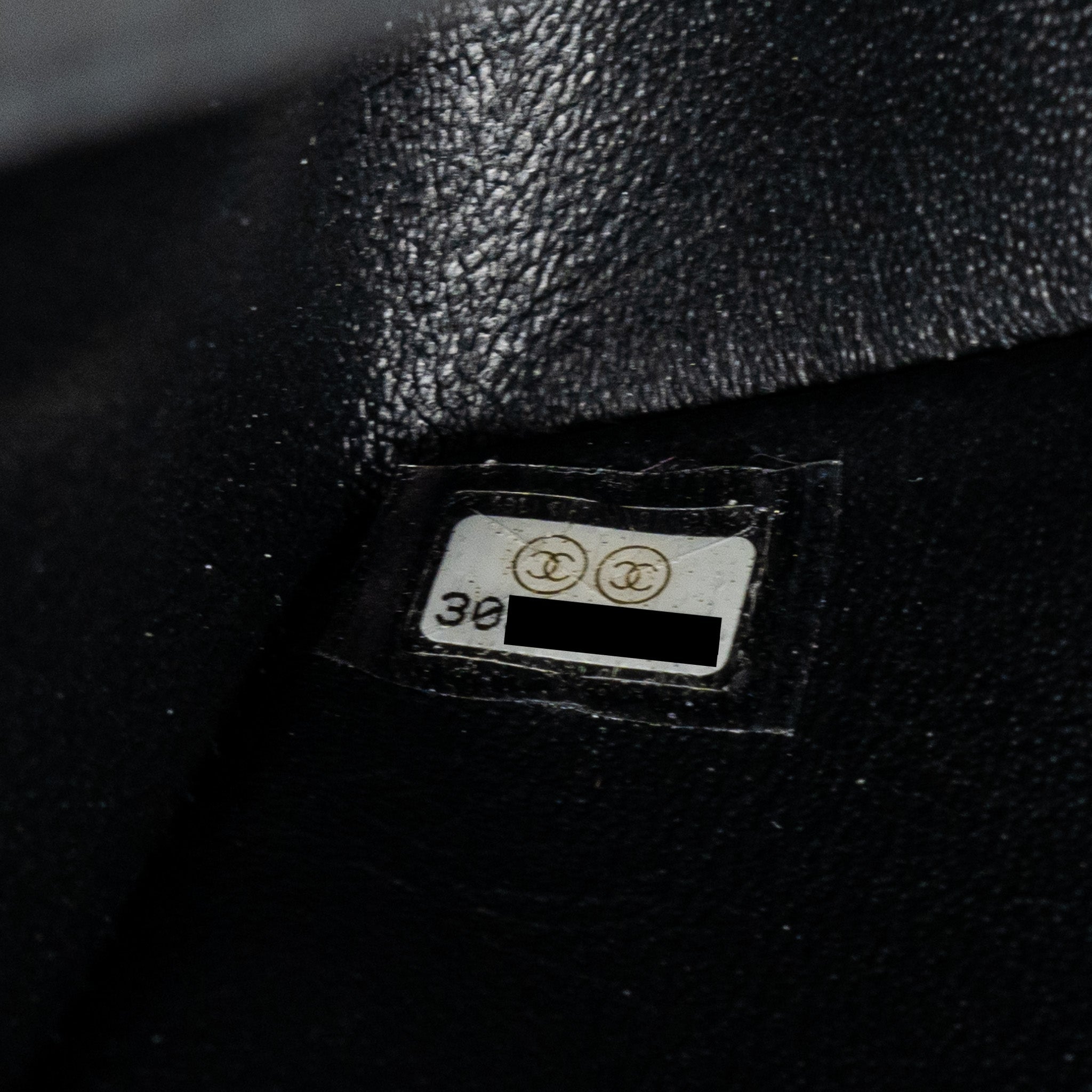CHANEL MINI 2.55 REISSUE FLAP BAG AGED CALFSKIN BLACK GHW