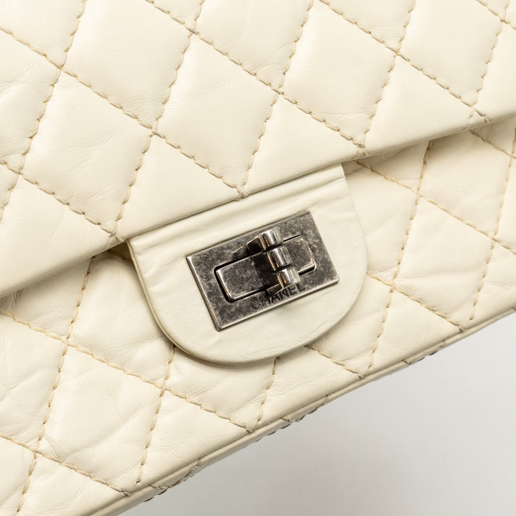 CHANEL MINI 2.55 REISSUE FLAP BAG AGED CALFSKIN CREAMY WHITE WITH RUTHENIUM HARDWARE