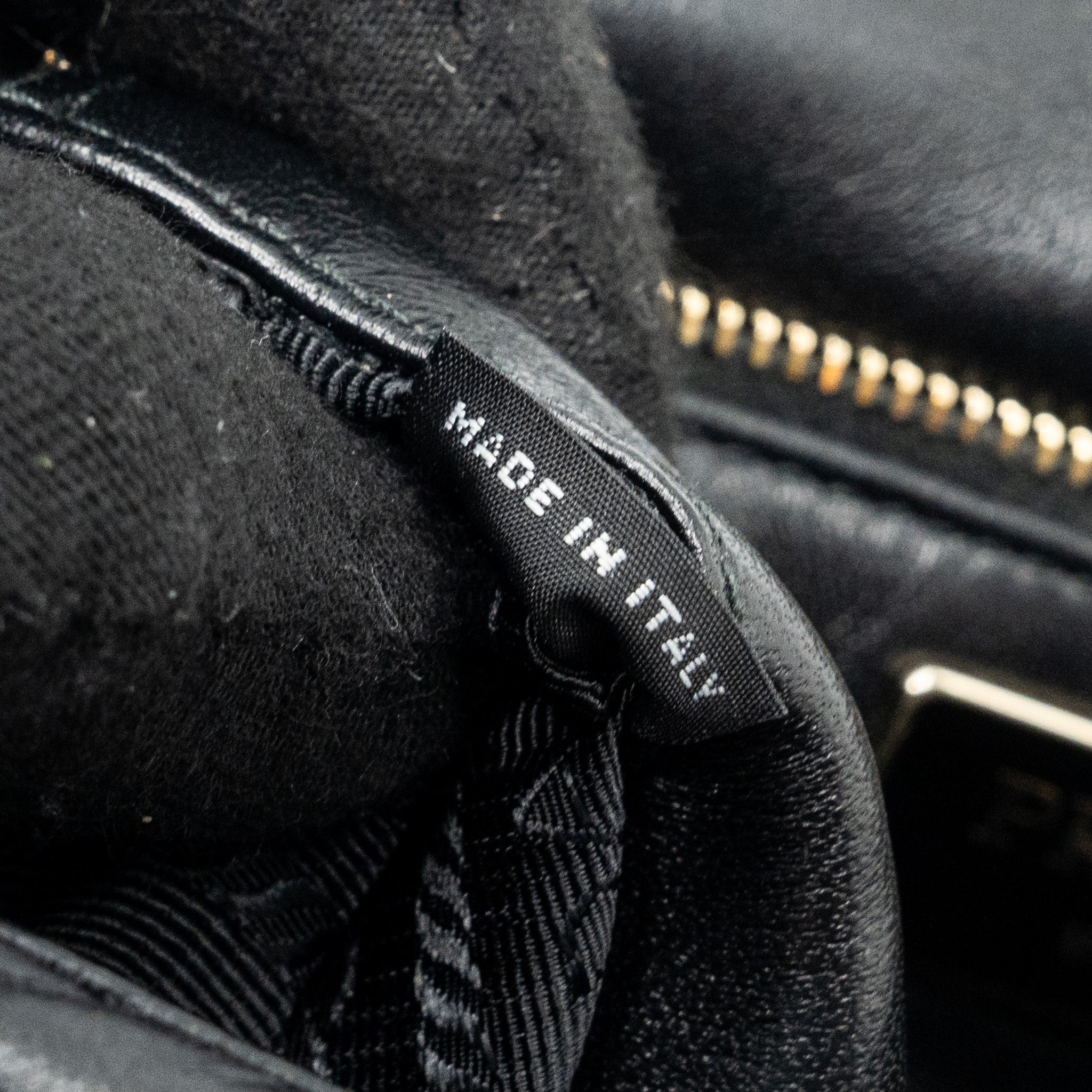 PRADA PATTINA IN PELLE NAPPA PATCH BLACK GHW
