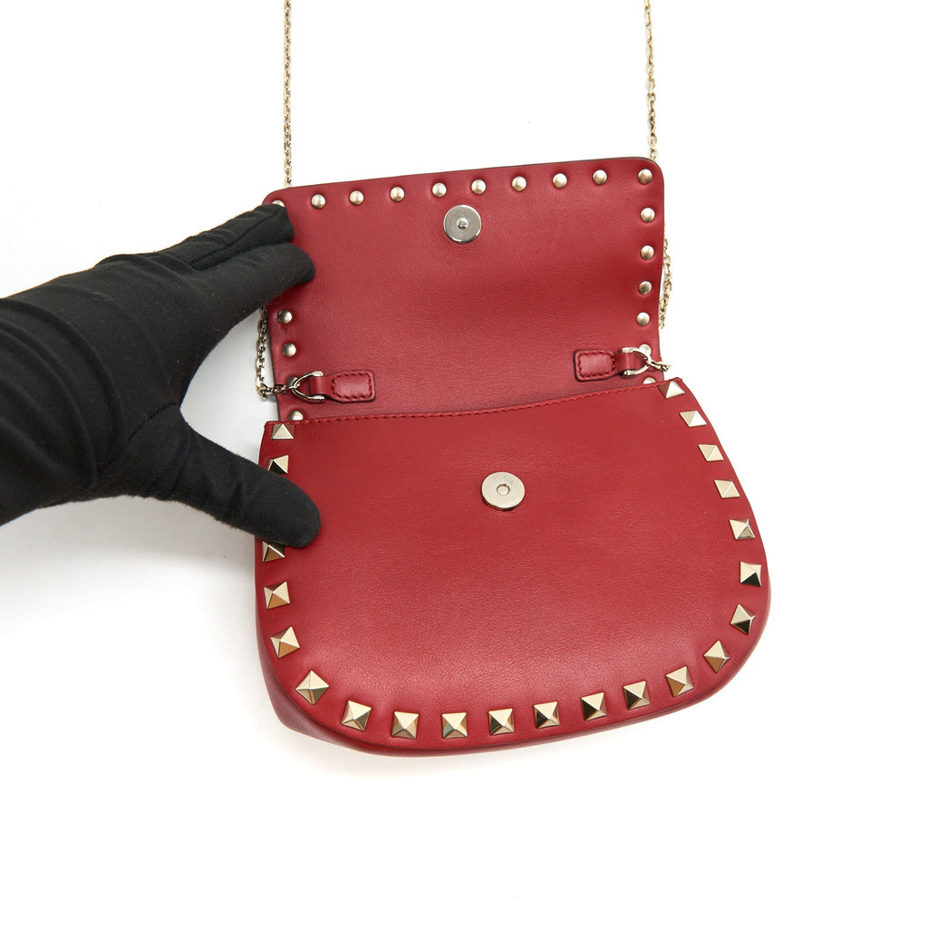 VALENTINO ROCKSTUD SMALL SADDLE BAG IN RED