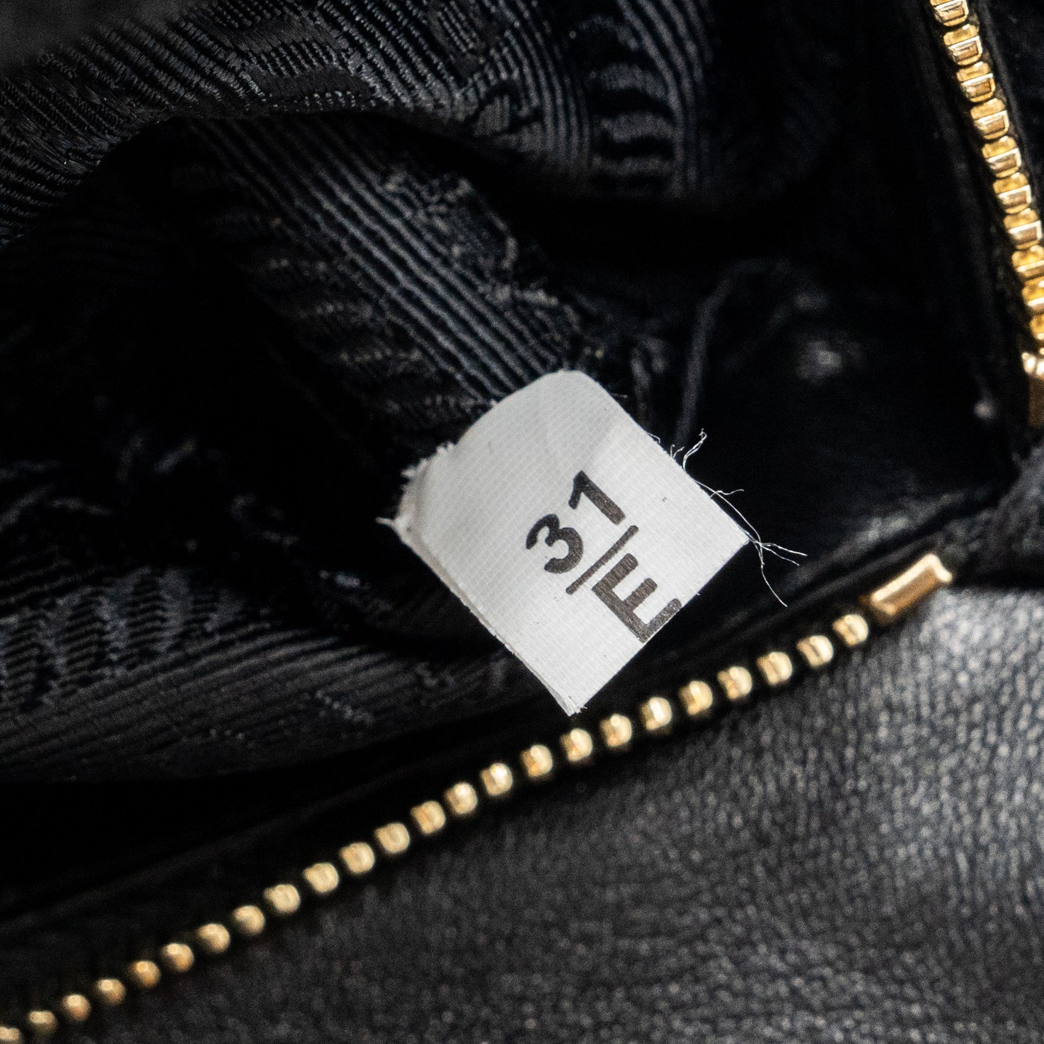 PRADA PATTINA IN PELLE NAPPA PATCH BLACK GHW
