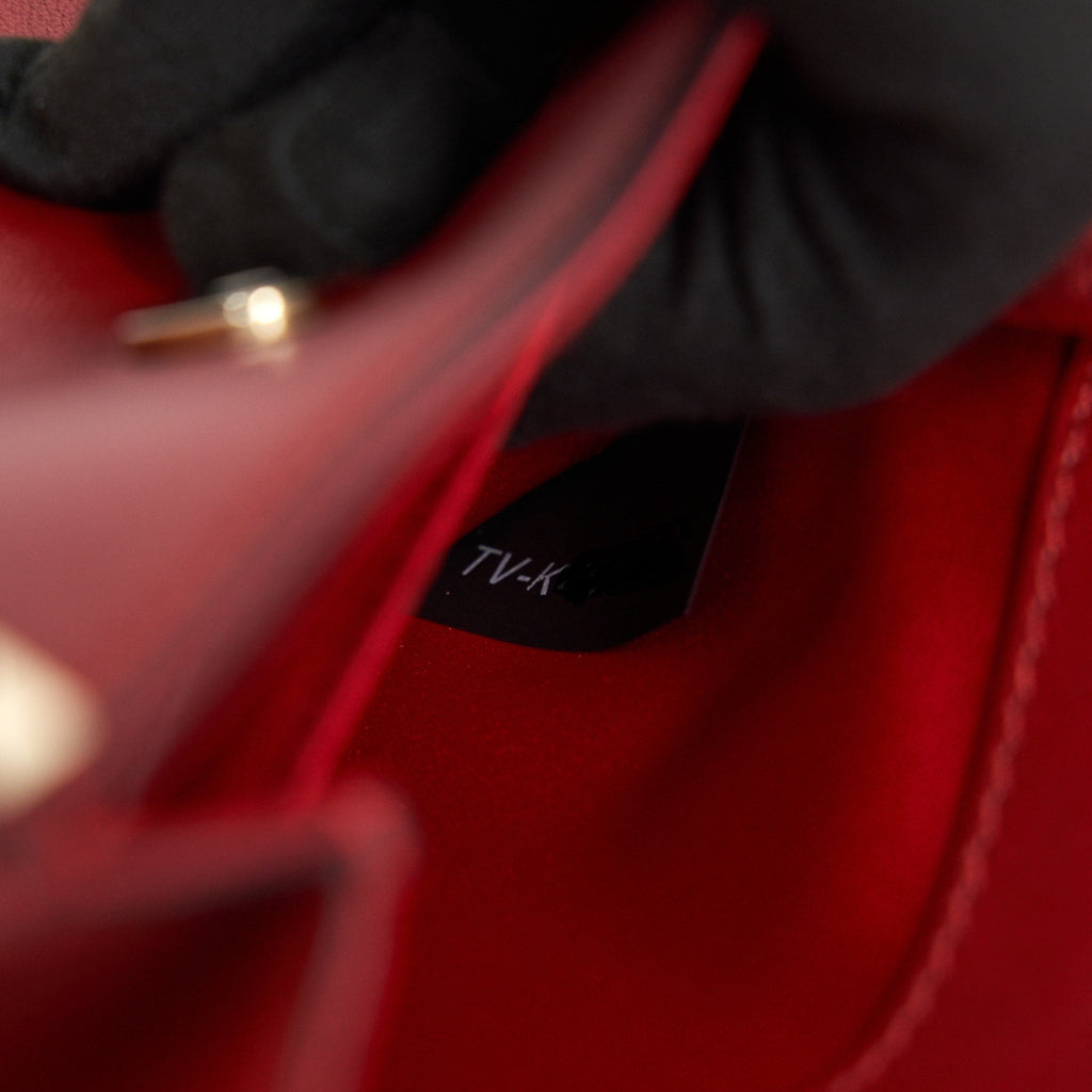 VALENTINO ROCKSTUD SMALL SADDLE BAG IN RED