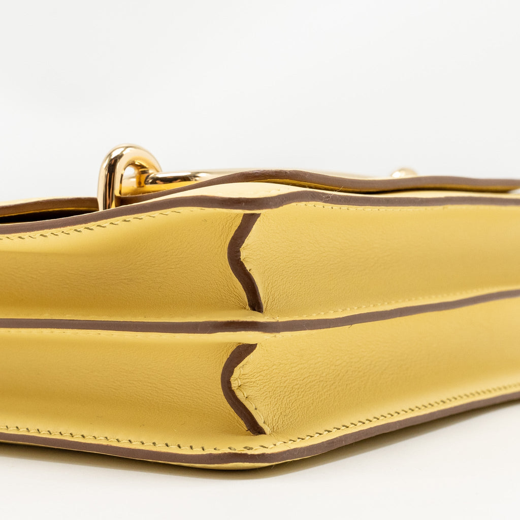 HERMES MINI ROULIS SWIFT 1Z JAUNE POUSSIN GHW