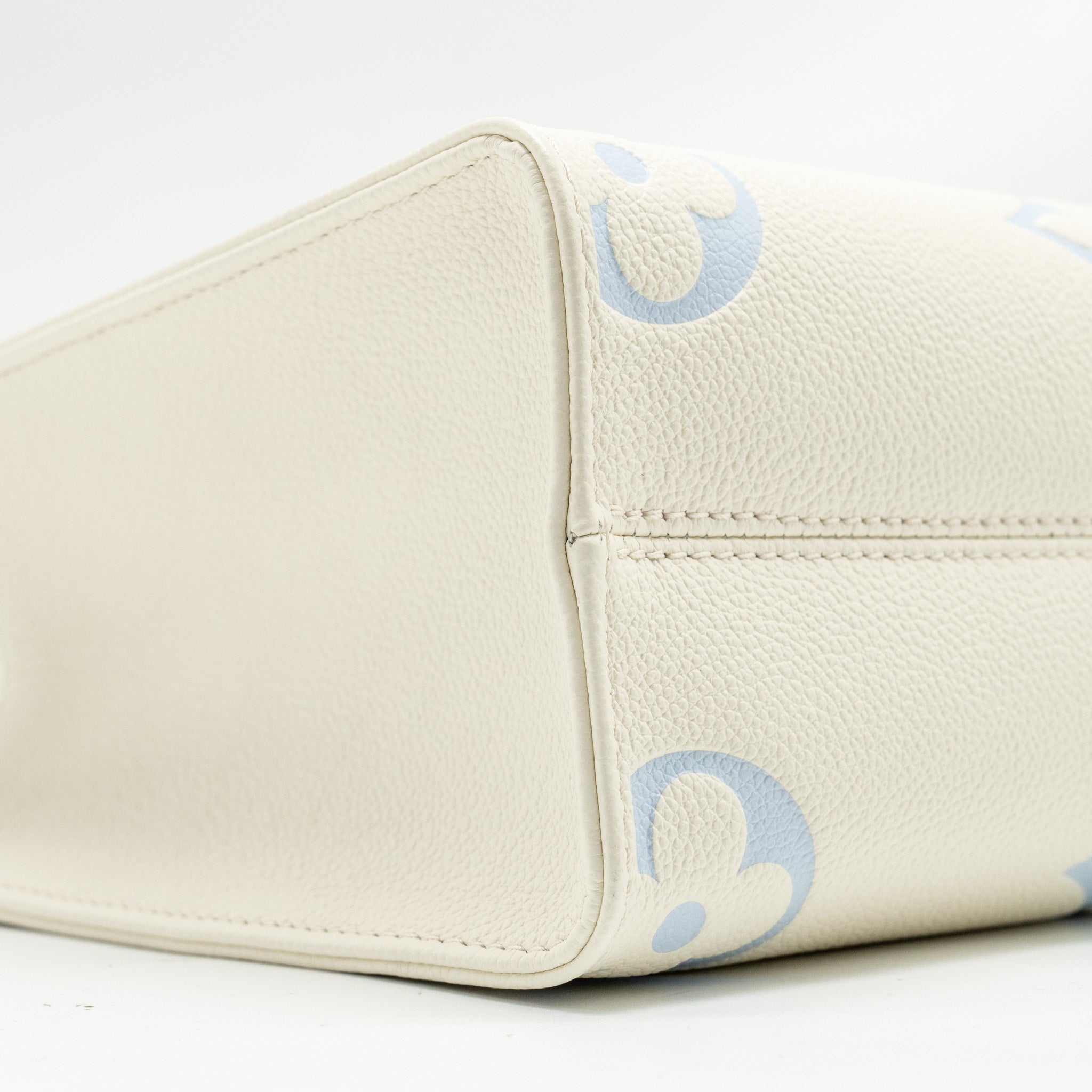 LOUIS VUITTON ONTHEGO PM BICOLOUR MONOGRAM EMPREINTE LATTE/CANDY BLUE GHW