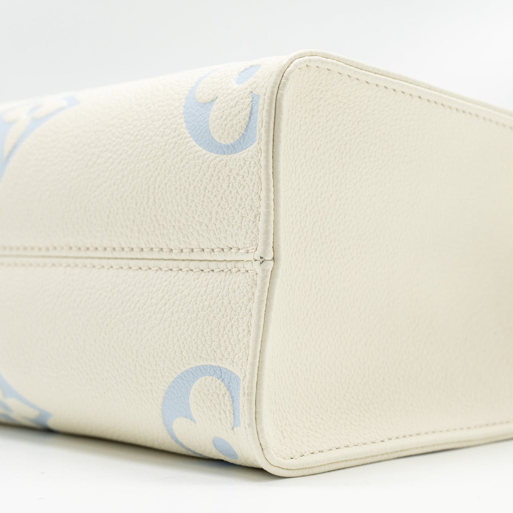 LOUIS VUITTON ONTHEGO PM BICOLOUR MONOGRAM EMPREINTE LATTE/CANDY BLUE GHW