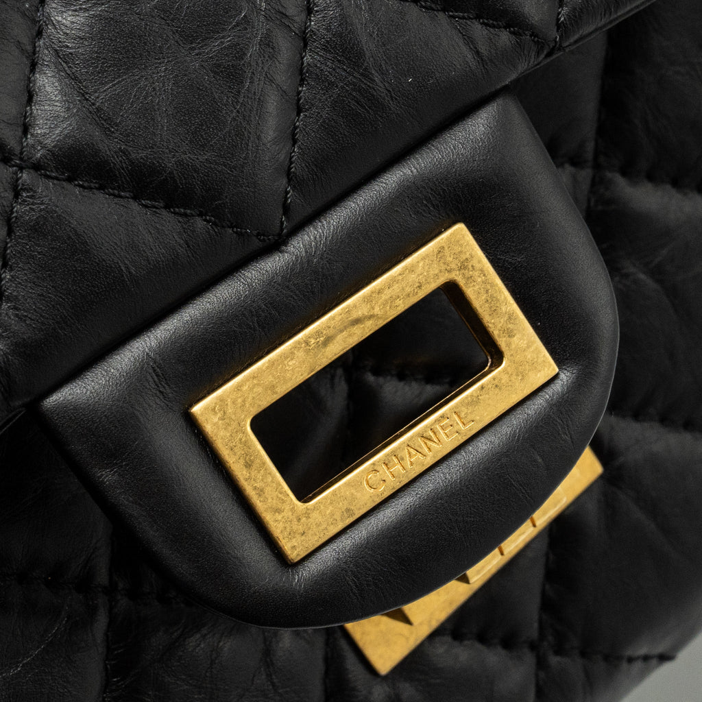 CHANEL MAXI 2.55 REISSUE FLAP BAG AGED CALFSKIN BLACK GHW