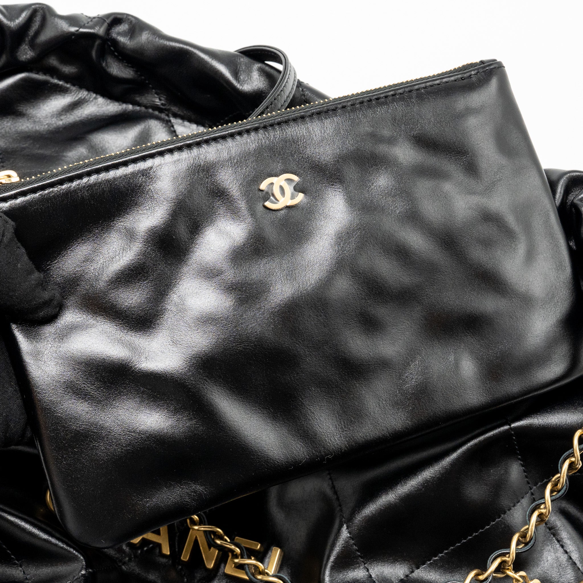 CHANEL MEDIUM 22 BAG GOLD LETTER SHINY CALFSKIN BLACK GHW (MICROCHIP)