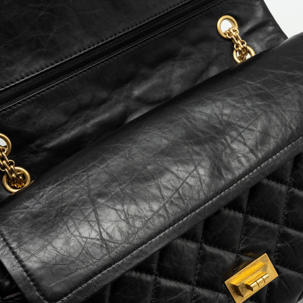 CHANEL MAXI 2.55 REISSUE FLAP BAG AGED CALFSKIN BLACK GHW