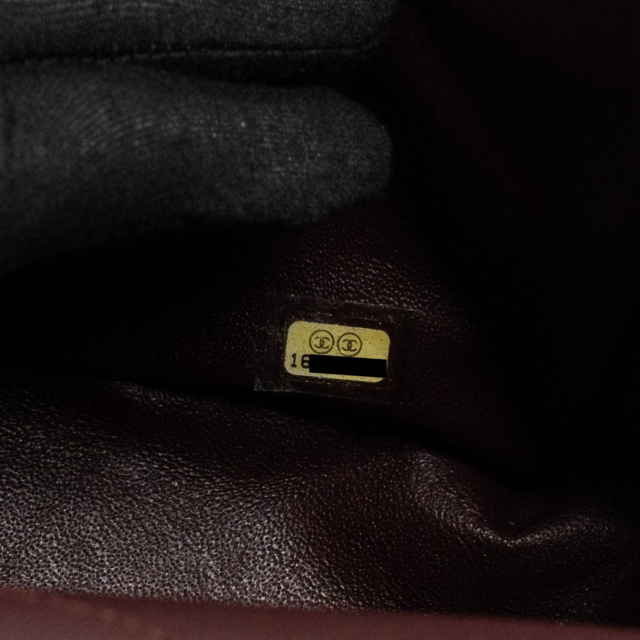 CHANEL MAXI 2.55 REISSUE FLAP BAG AGED CALFSKIN BLACK GHW