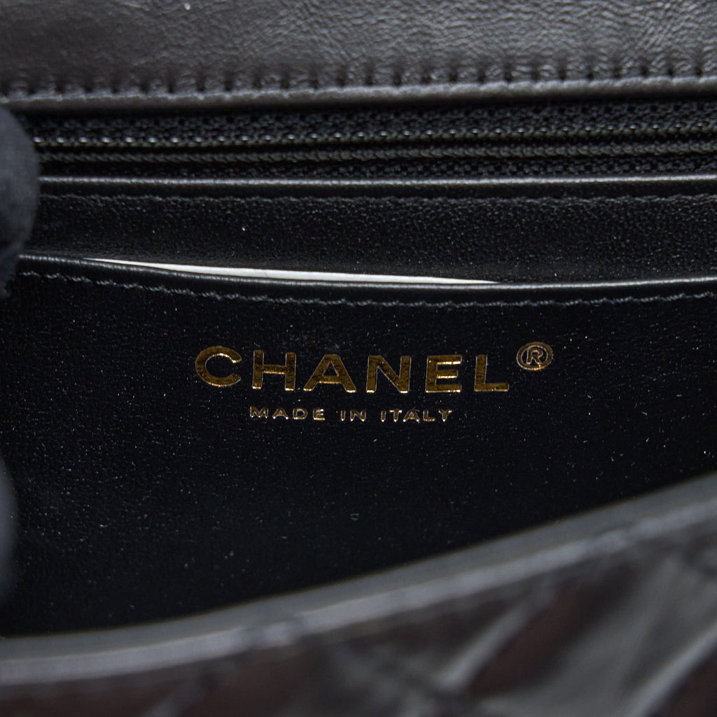 CHANEL MINI 2.55 REISSUE FLAP BAG AGED CALFSKIN BLACK BRUSHED GHW (MICROCHIP)