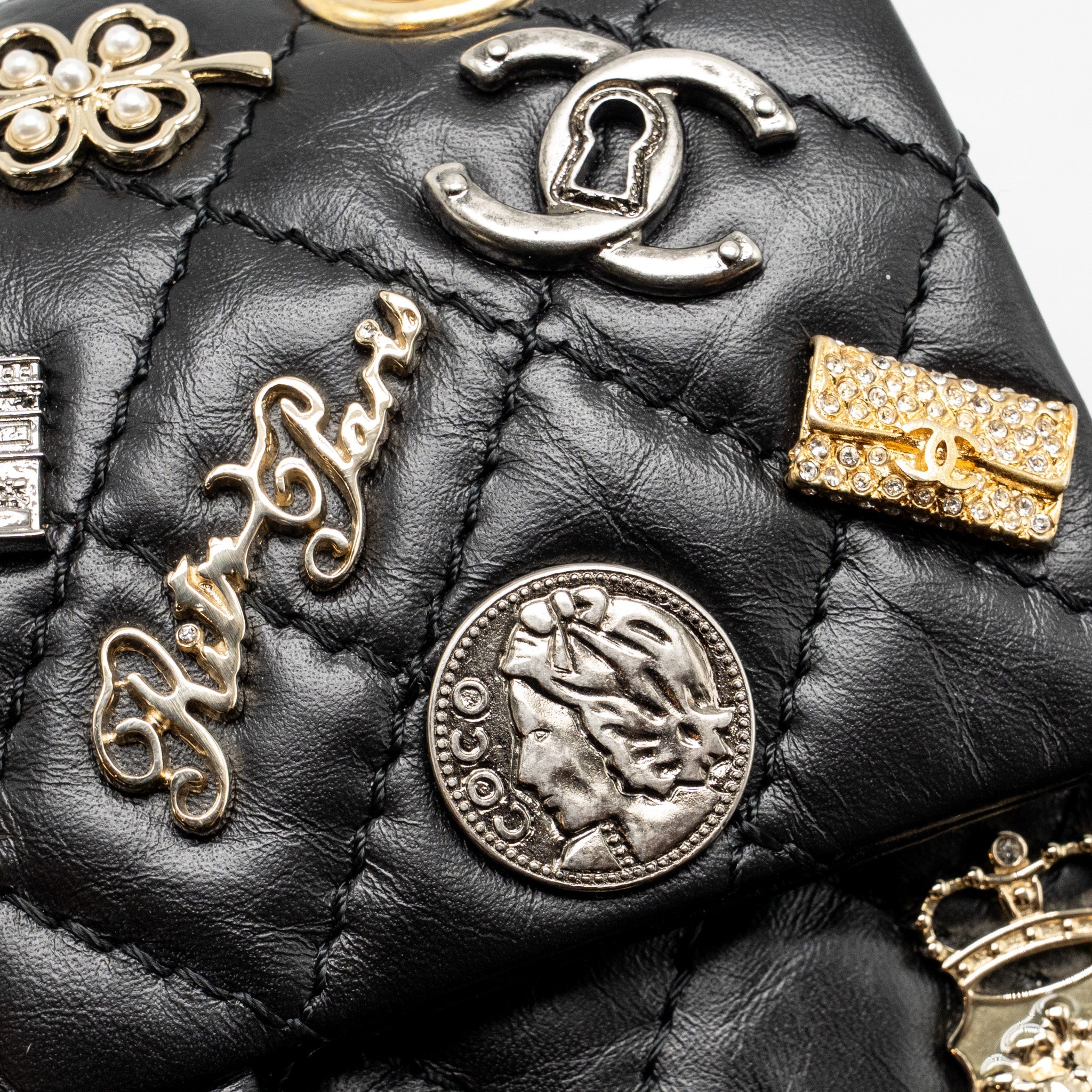 CHANEL MINI 2.55 REISSUE FLAP BAG LUCKY CHARMS AGED CALFSKIN BLACK GHW