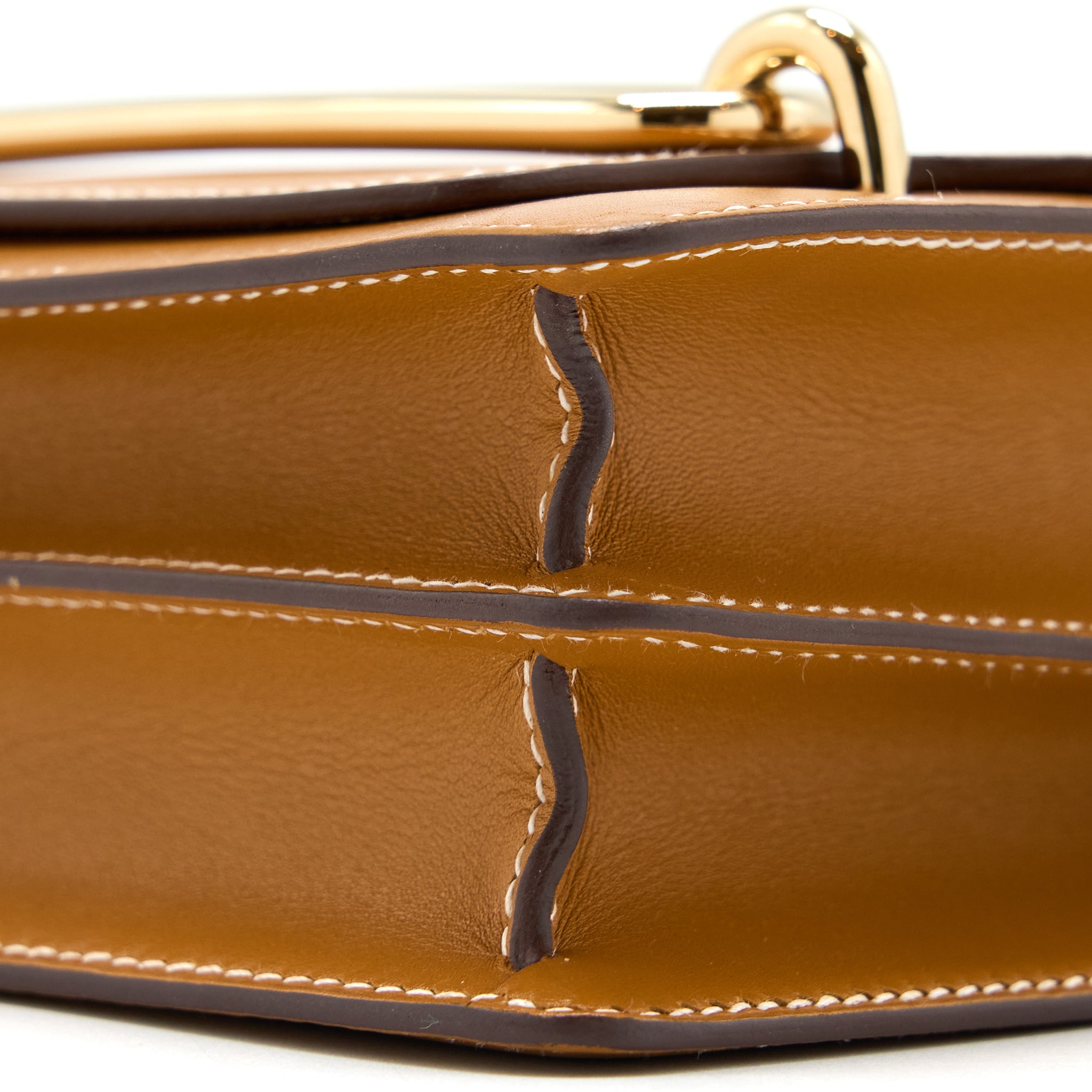 HERMES MINI ROULIS VEAU BUTLER GOLD GHW