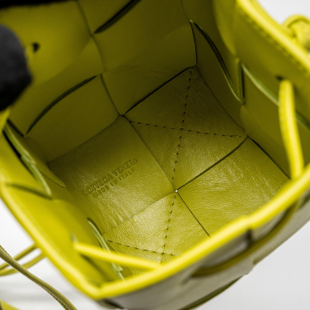 BOTTEGA VENETA MINI CASSETTE BUCKET BAG LAMBSKIN YELLOW