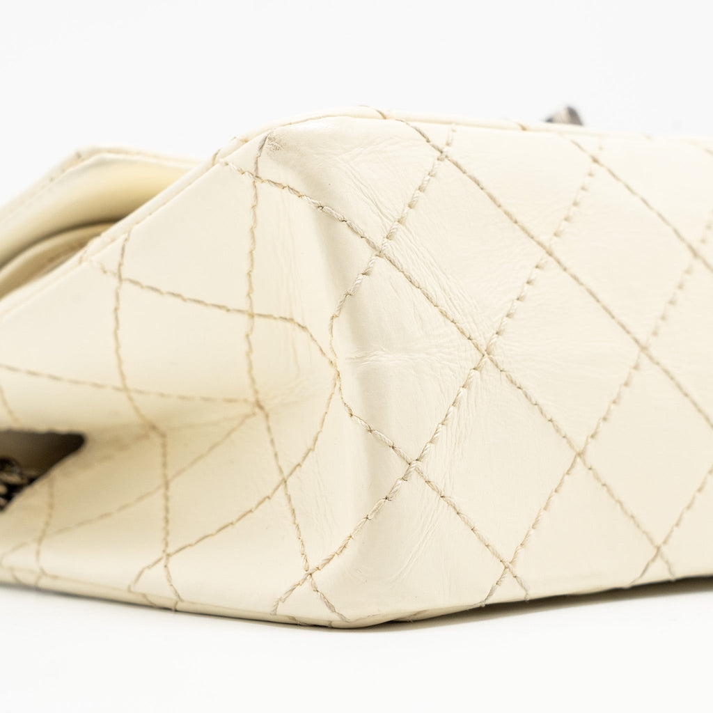 CHANEL MINI 2.55 REISSUE FLAP BAG AGED CALFSKIN CREAMY WHITE WITH RUTHENIUM HARDWARE