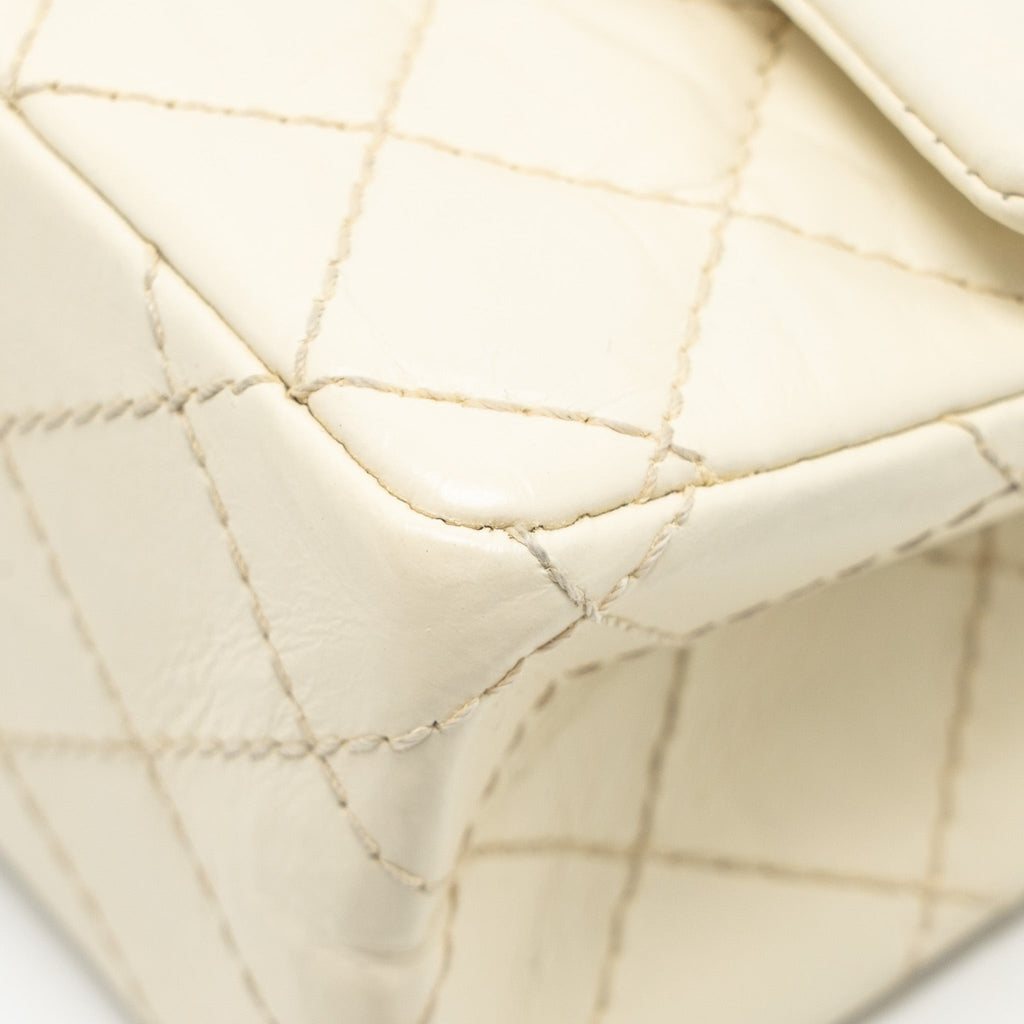 CHANEL MINI 2.55 REISSUE FLAP BAG AGED CALFSKIN CREAMY WHITE WITH RUTHENIUM HARDWARE