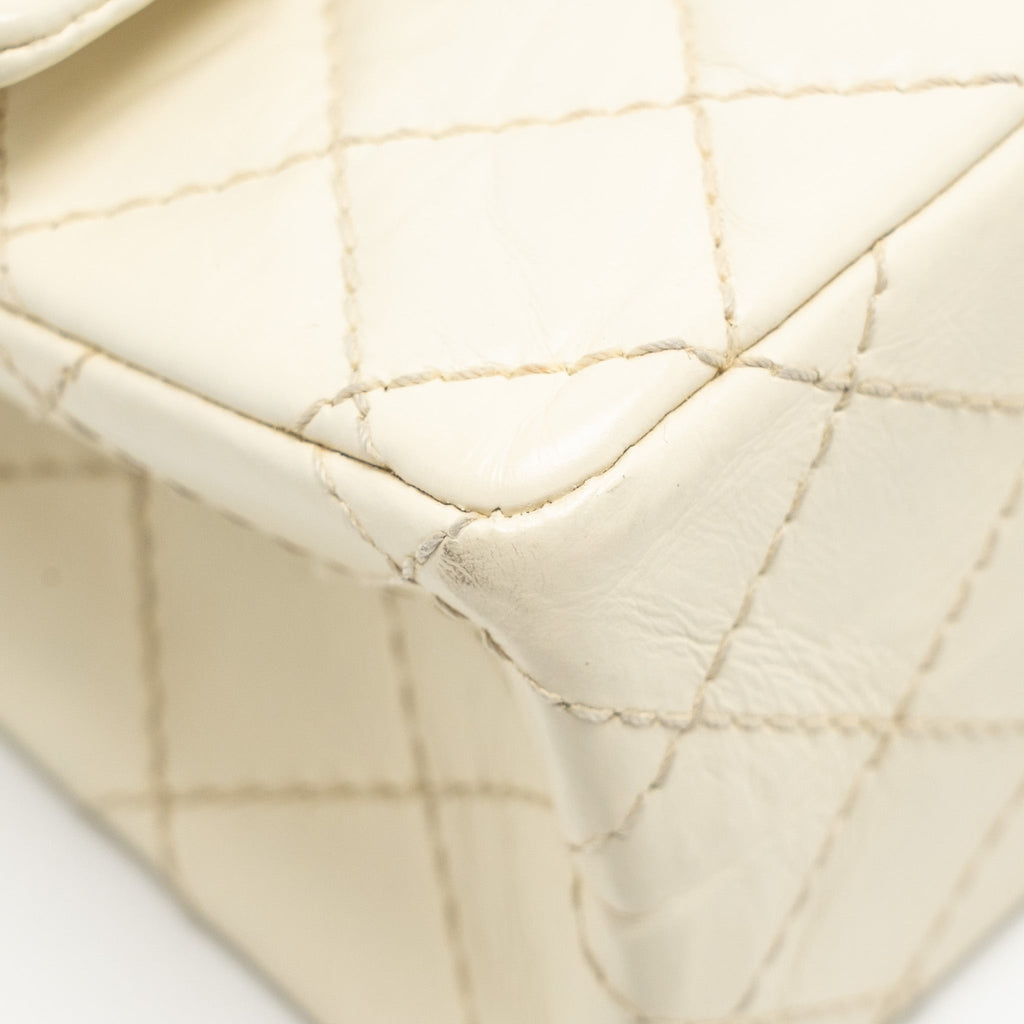 CHANEL MINI 2.55 REISSUE FLAP BAG AGED CALFSKIN CREAMY WHITE WITH RUTHENIUM HARDWARE