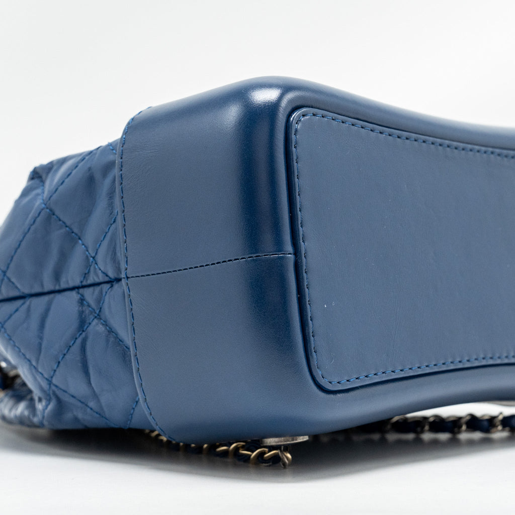 CHANEL GABRIELLE BACKPACK AGED CALFSKIN BLUE MULTICOLOUR HARDWARE