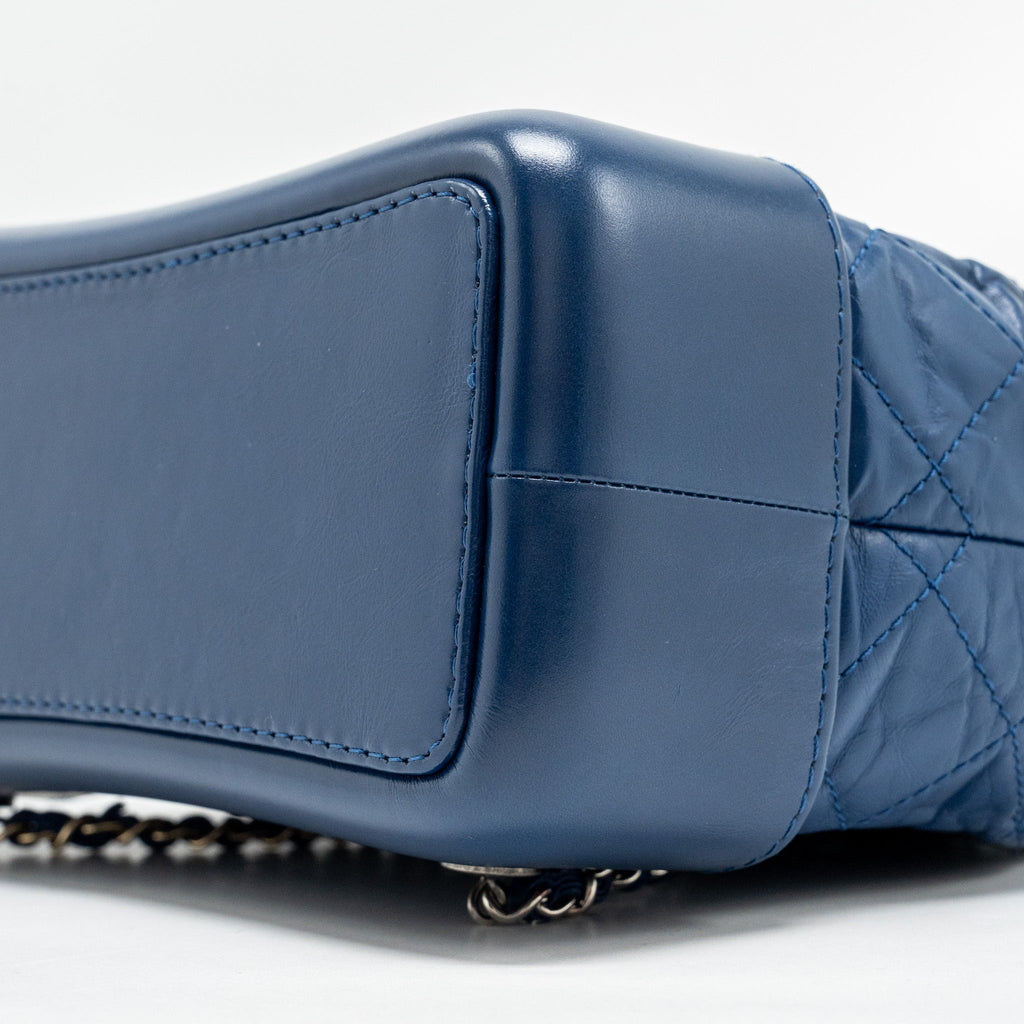 CHANEL GABRIELLE BACKPACK AGED CALFSKIN BLUE MULTICOLOUR HARDWARE