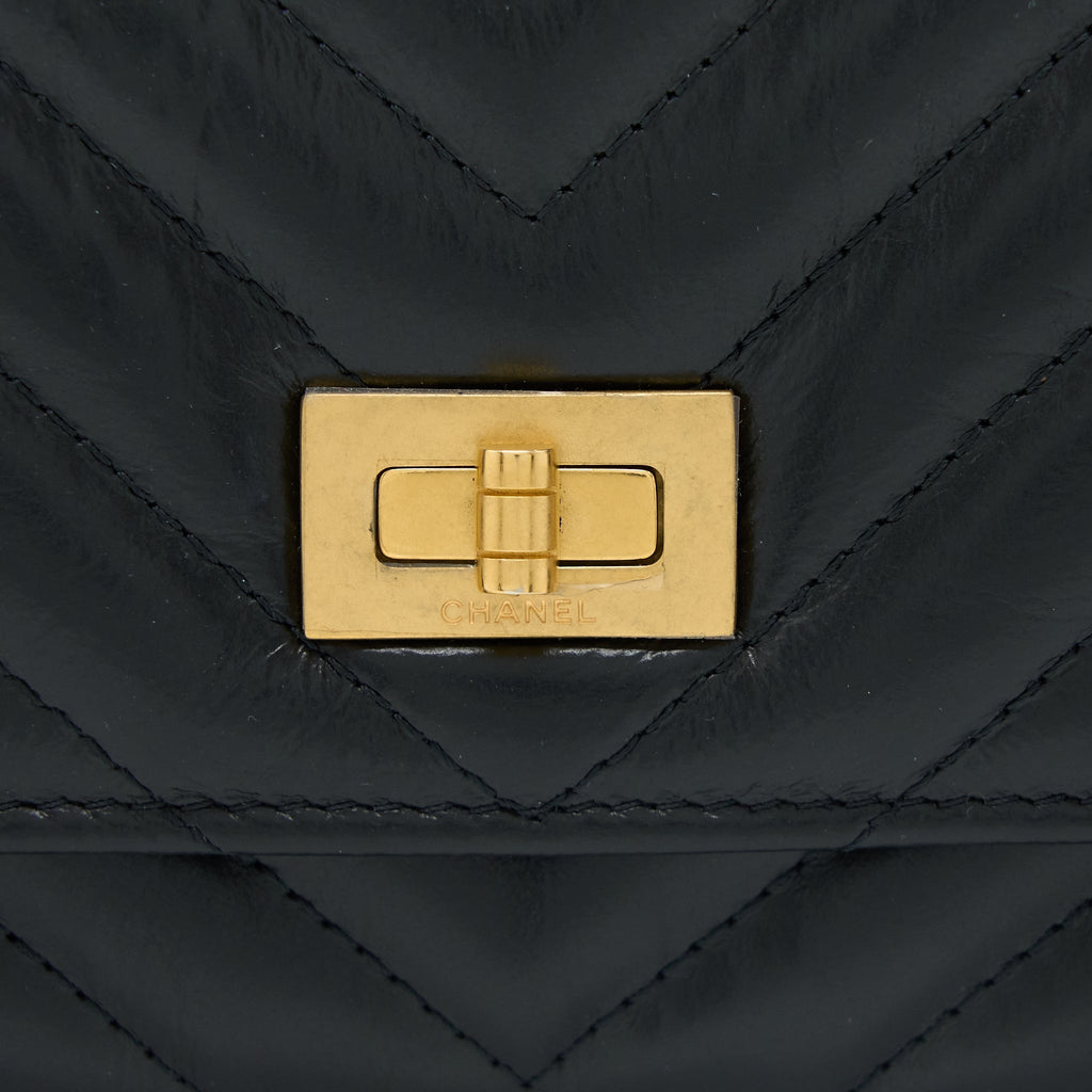 CHANEL 2.55 REISSUE WALLET ON CHAIN CHEVRON AGED CALFSKIN BLACK BRUSHED GHW (MICROCHIP)