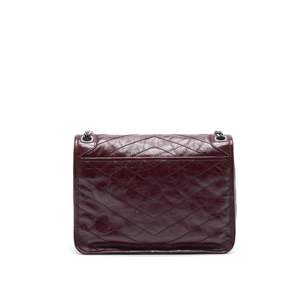 SAINT LAURENT MEDIUM NIKI SHINNY LEATHER BURGUNDY