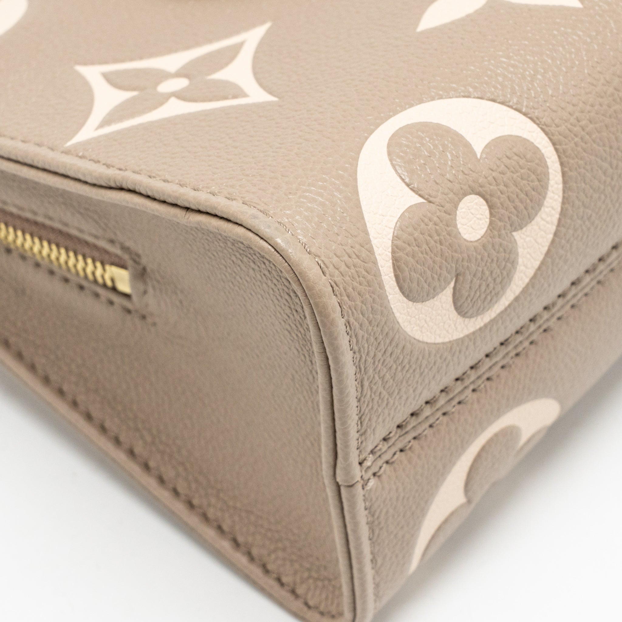LOUIS VUITTON ONTHEGO EAST WEST MONOGRAM EMPREINTE LEATHER DOVE/CREAM GHW