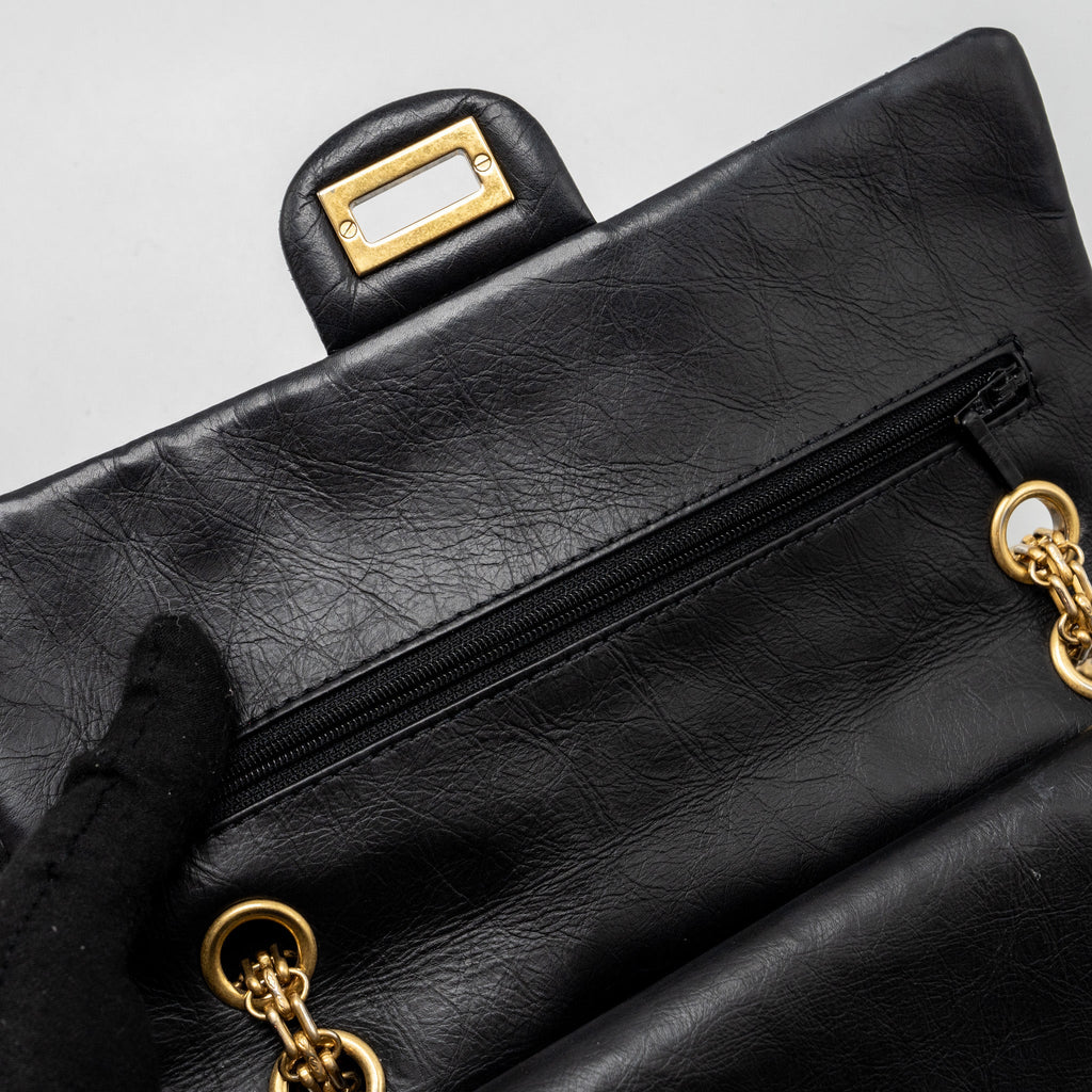CHANEL SMALL 2.55 REISSUE DOUBLE FLAP BAG AGED CALFSKIN BLACK GHW
