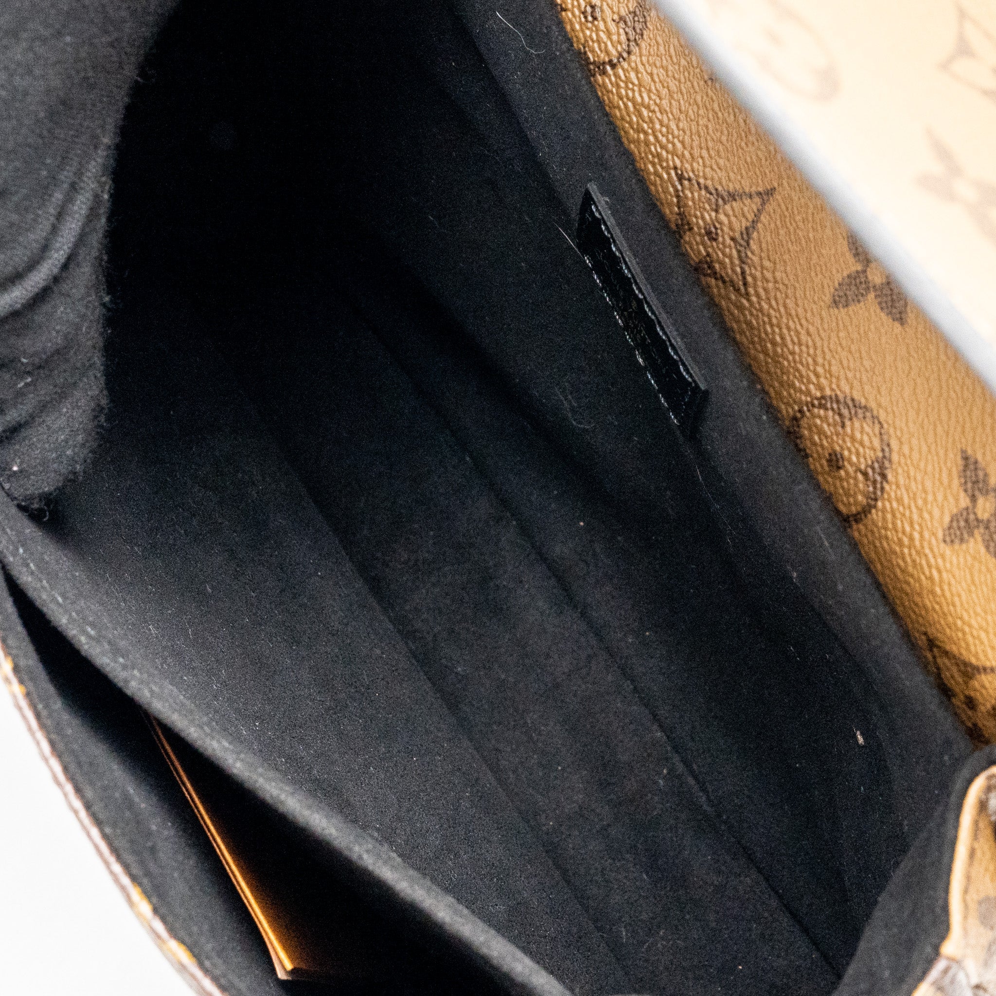 LOUIS VUITTON POCHETTE MÉTIS MONOGRAM REVERSE CANVAS GHW