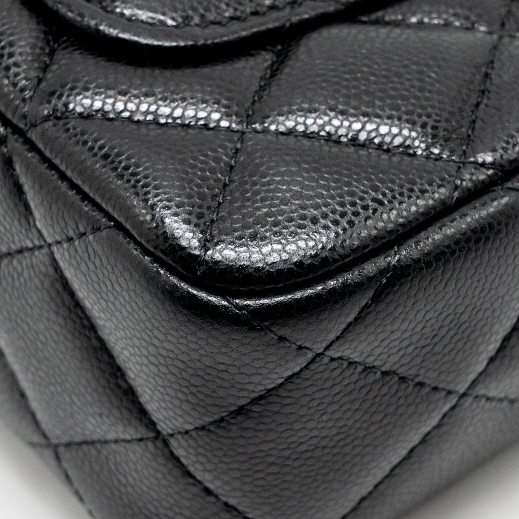 CHANEL 25A ZIP CLUTCH WITH CHAIN CAVIAR BLACK LGHW (MICROCHIP)