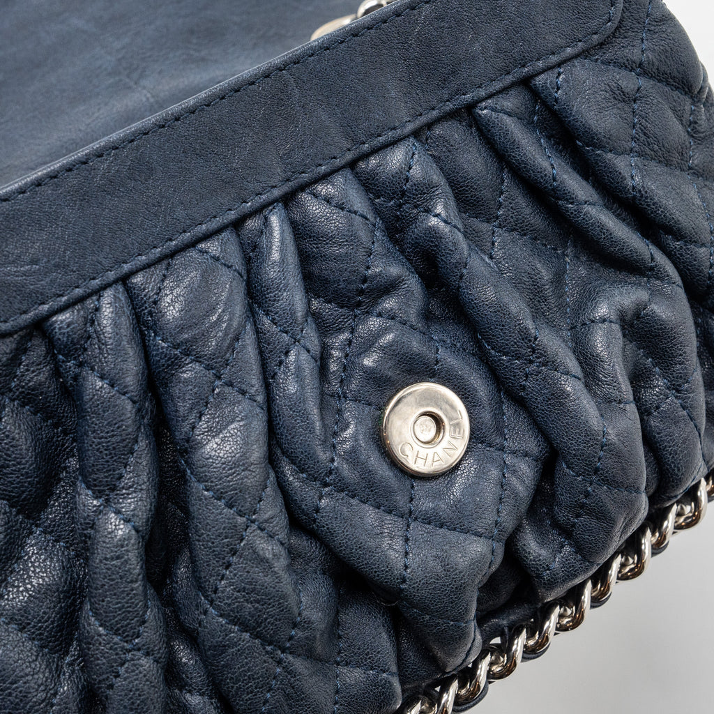 CHANEL MINI ROUND FLAP BAG WITH CHAIN AGED CALFSKIN NAVY SHW
