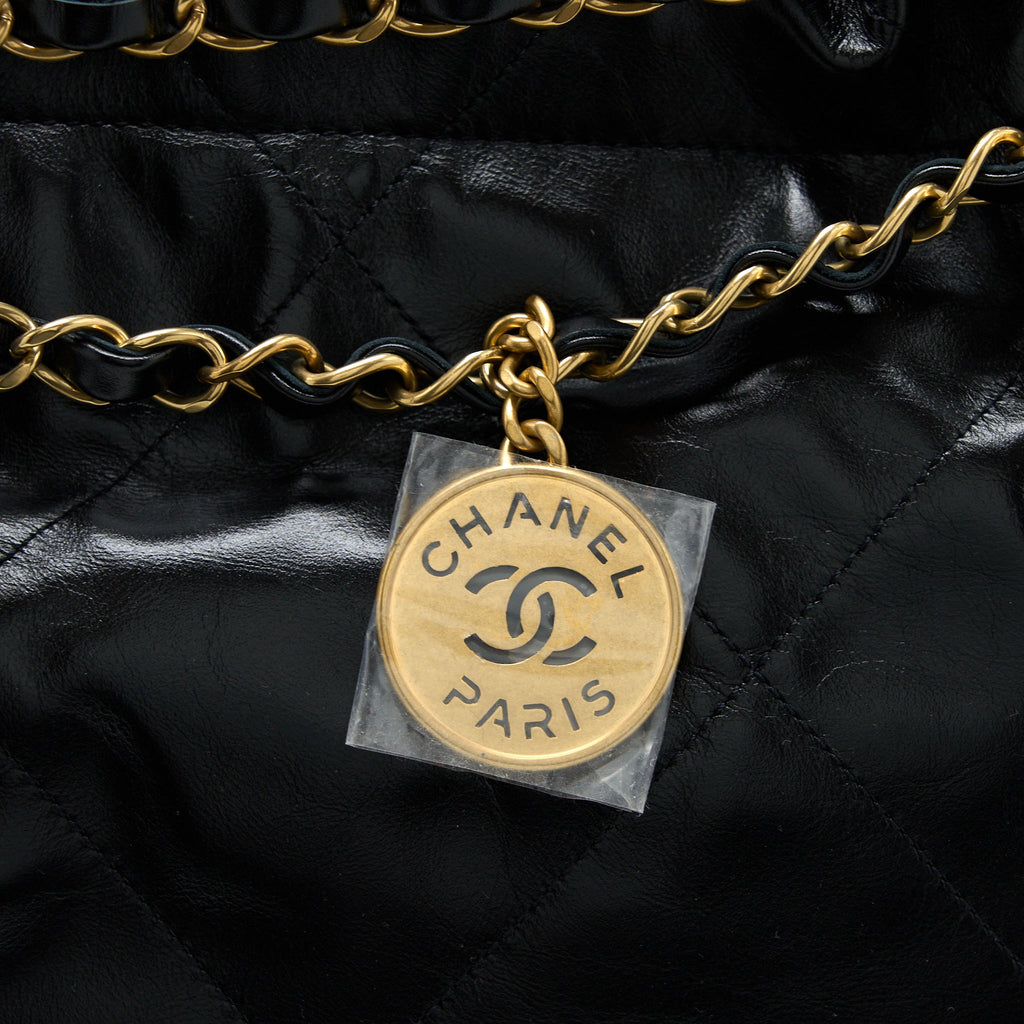 CHANEL MEDIUM 22 BAG GOLD LETTER SHINY CALFSKIN BLACK GHW (MICROCHIP)