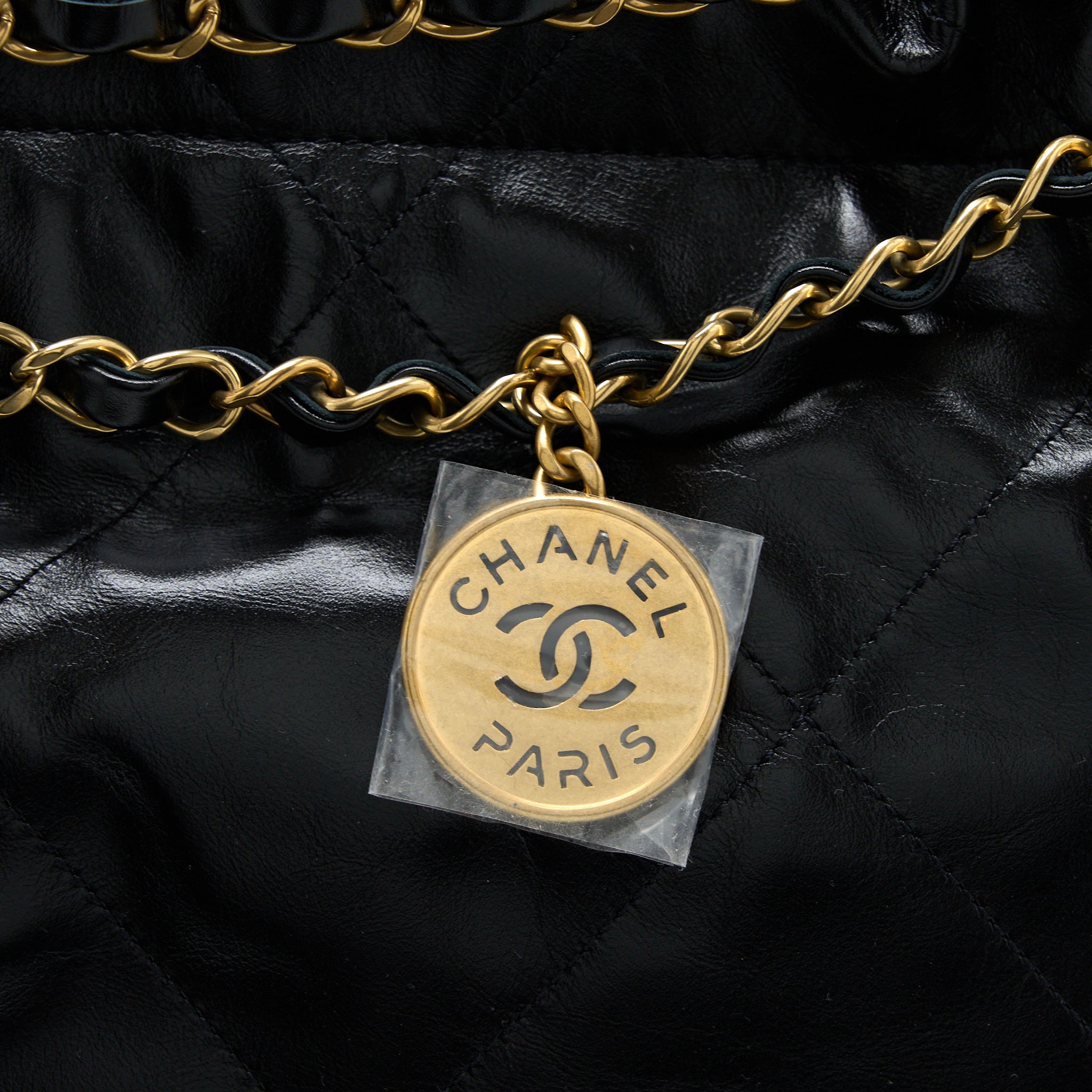 CHANEL MEDIUM 22 BAG GOLD LETTER SHINY CALFSKIN BLACK GHW (MICROCHIP)