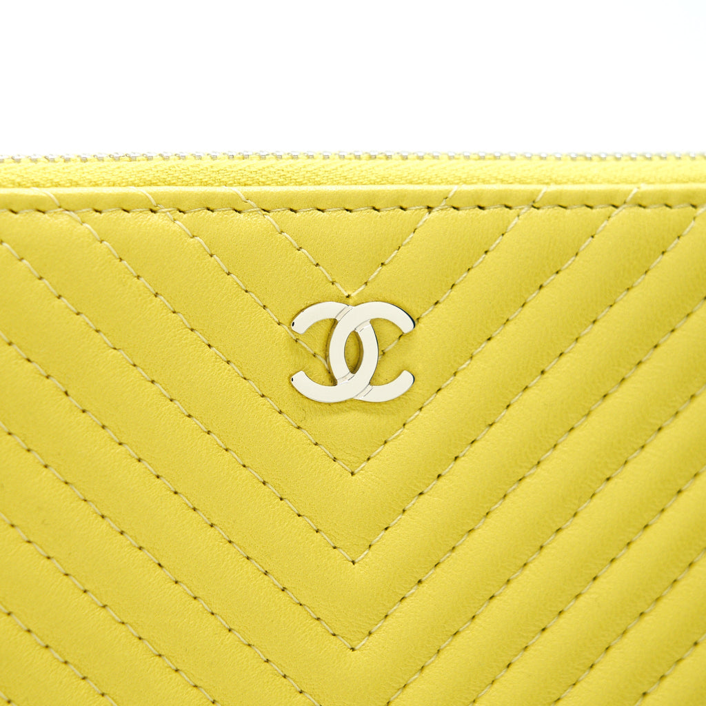 CHANEL CHEVRON CLUTCH BAG IN YELLOW SHW