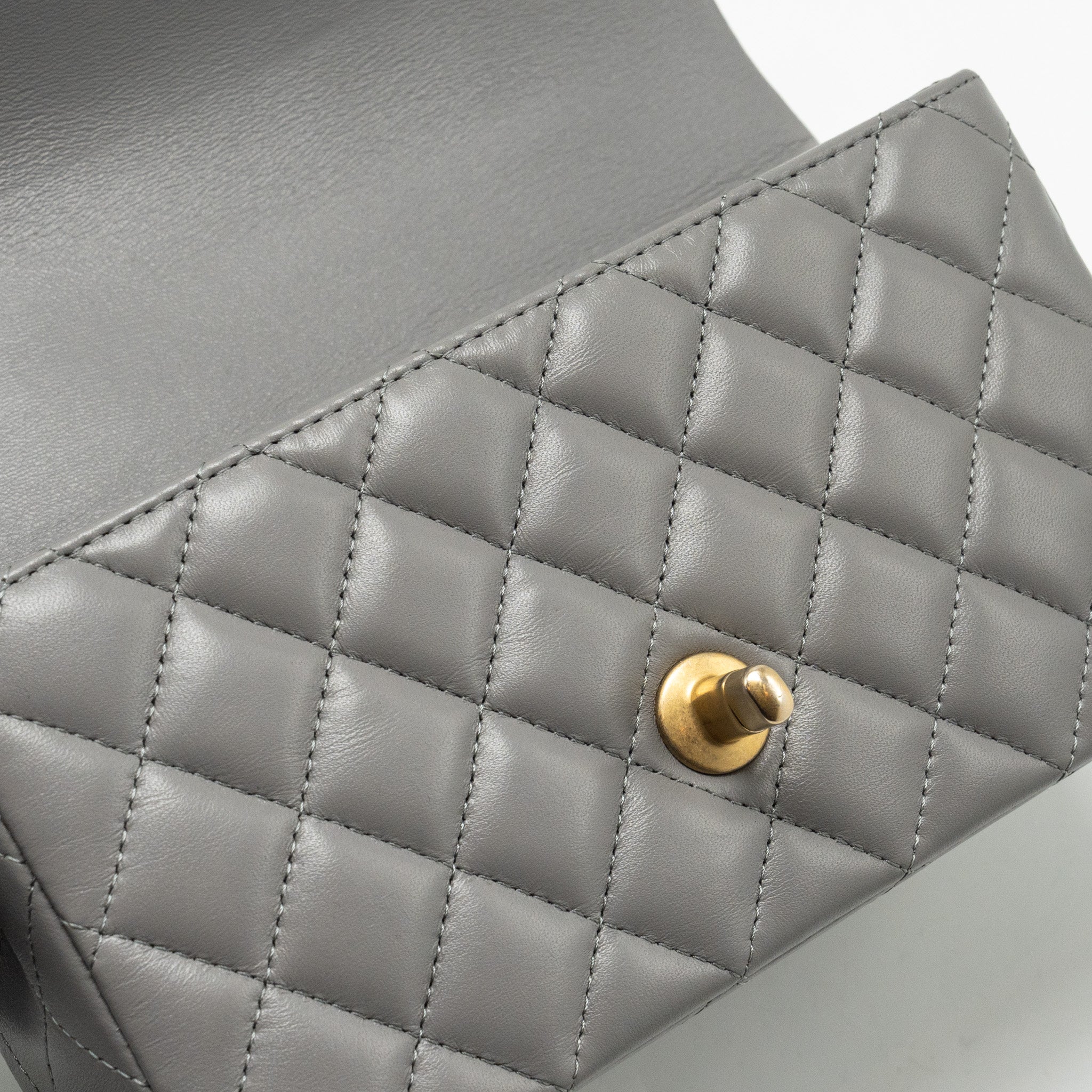 CHANEL 22K METAL TOP HANDLE MINI RECTANGULAR FLAP BAG LAMBSKIN GREY GHW (MICROCHIP)