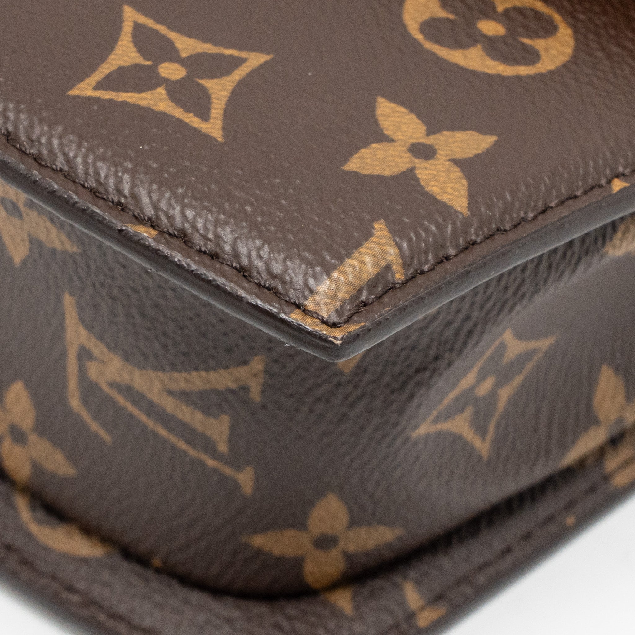 LOUIS VUITTON TILSITT MONOGRAM REVERSE CANVAS GHW