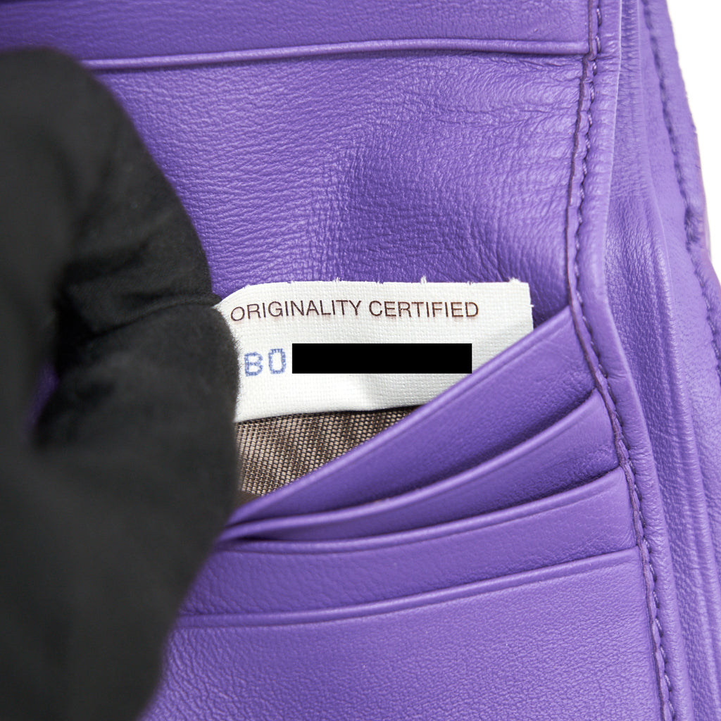 BOTTEGA VENETA LEATHER SMALL COMPACT AND LONG WALLET IN PURPLE SELL IN A SET
