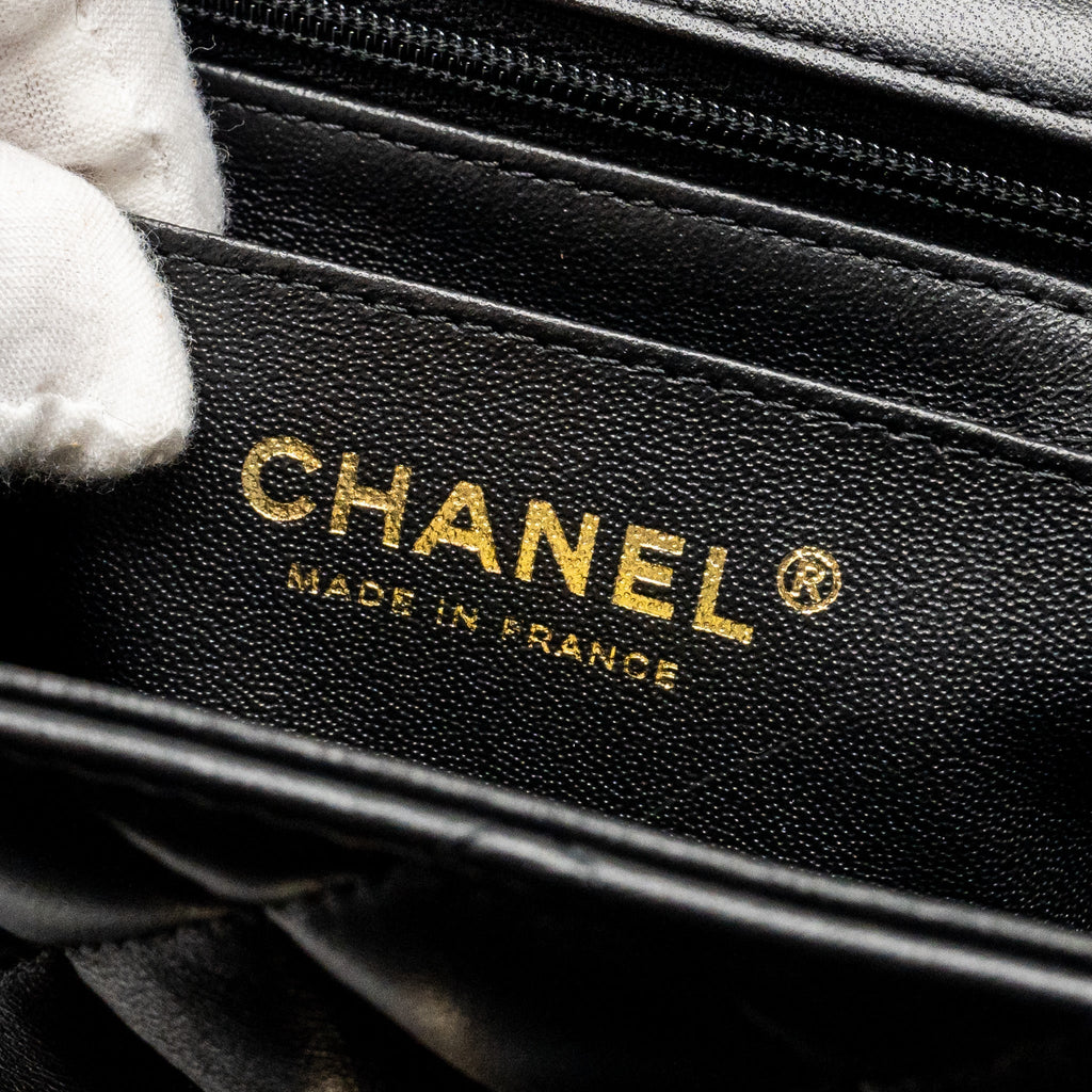 CHANEL TOP HANDLE MINI RECTANGULAR FLAP BAG WITH LION CHARM LAMBSKIN BLACK LGHW (MICROCHIP)