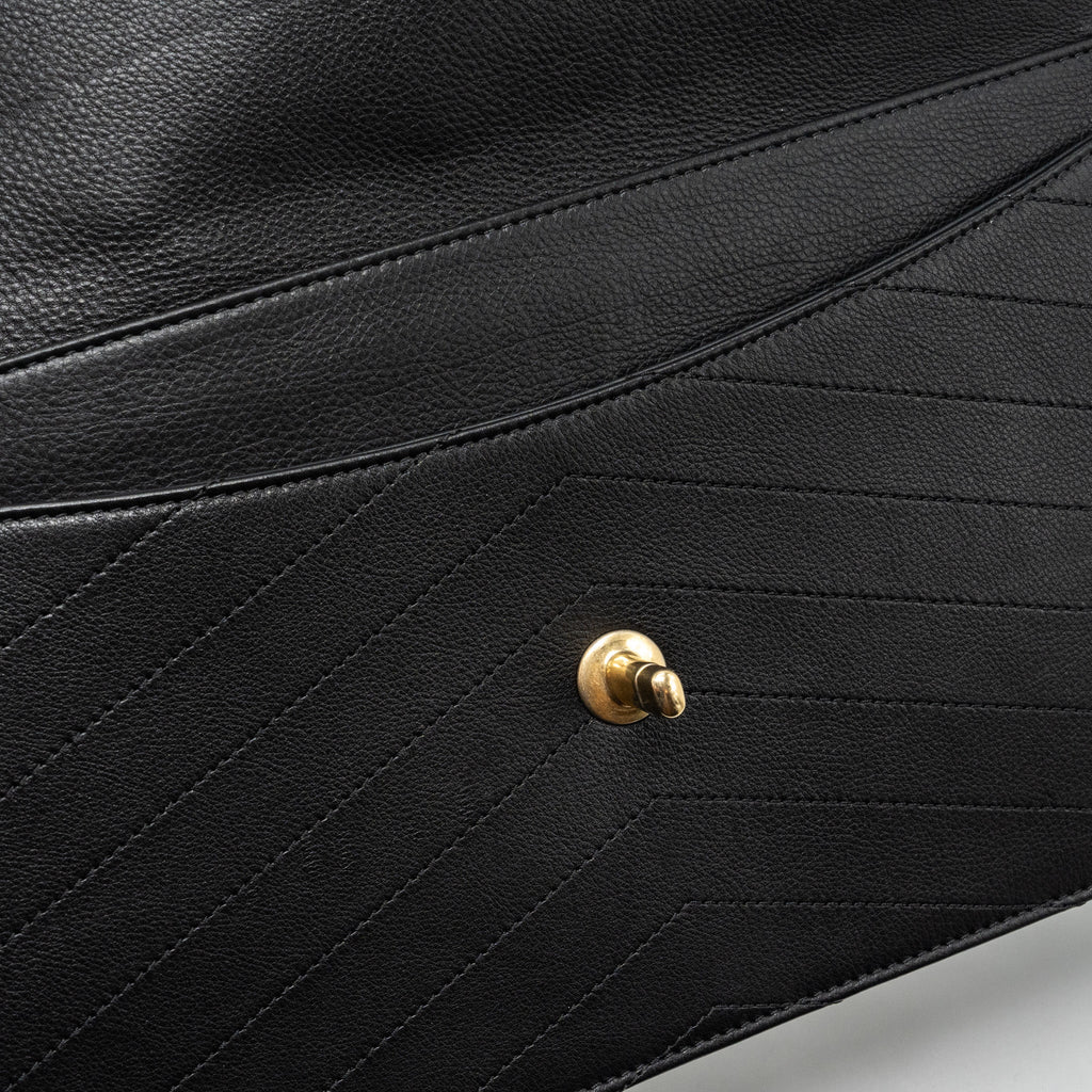 CHANEL VOYAGE CHEVRON CLUTCH CALFSKIN BLACK GHW