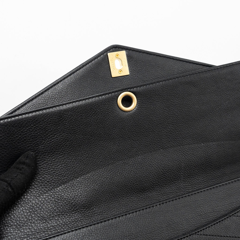 CHANEL VOYAGE CHEVRON CLUTCH CALFSKIN BLACK GHW