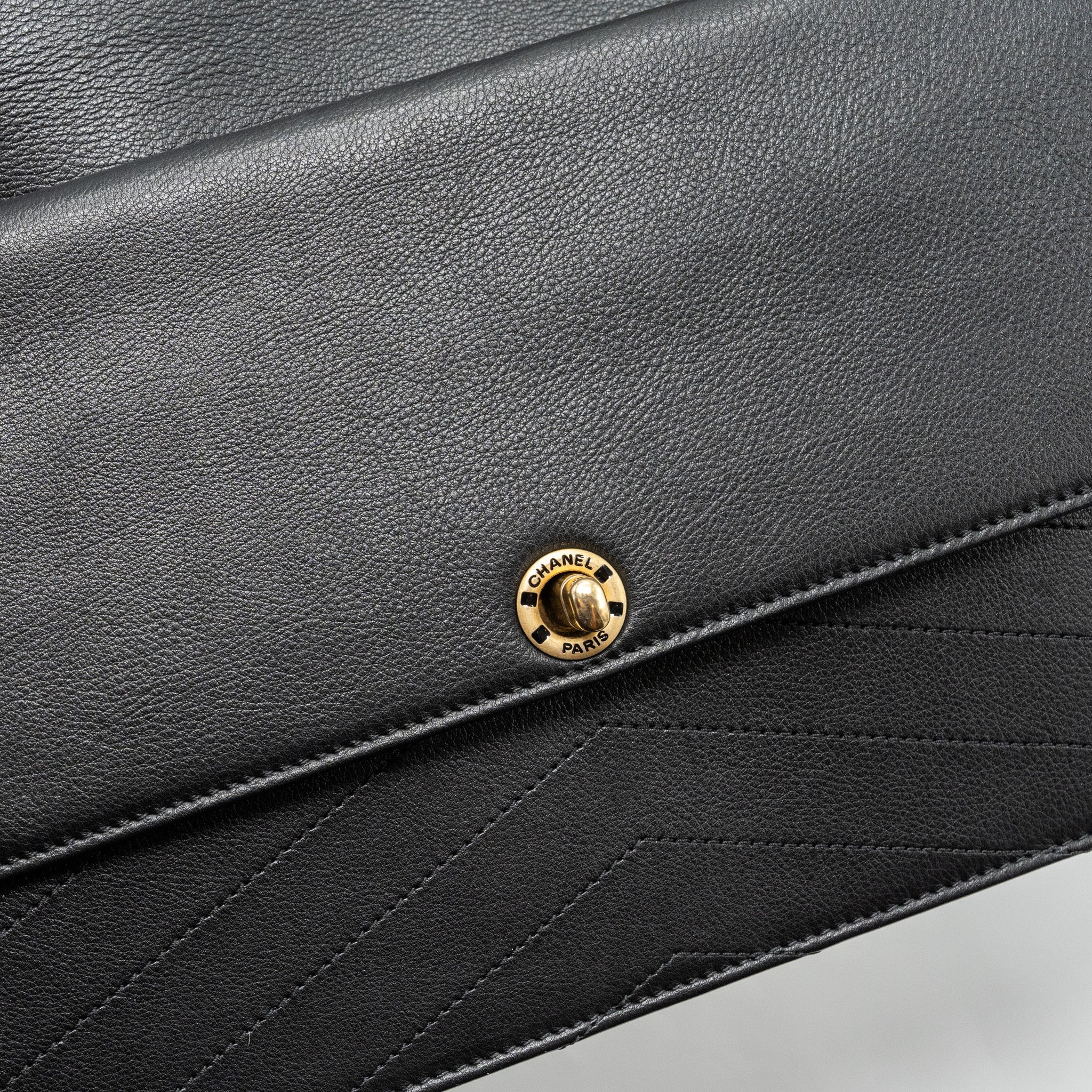 CHANEL VOYAGE CHEVRON CLUTCH CALFSKIN BLACK GHW