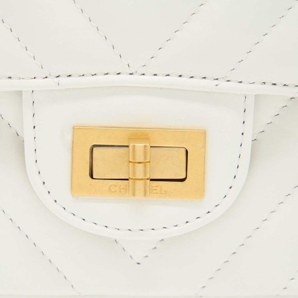 CHANEL MINI 2.55 REISSUE CHEVRON FLAP BAG AGED CALFSKIN WHITE BRUSHED GHW (MICROCHIP)