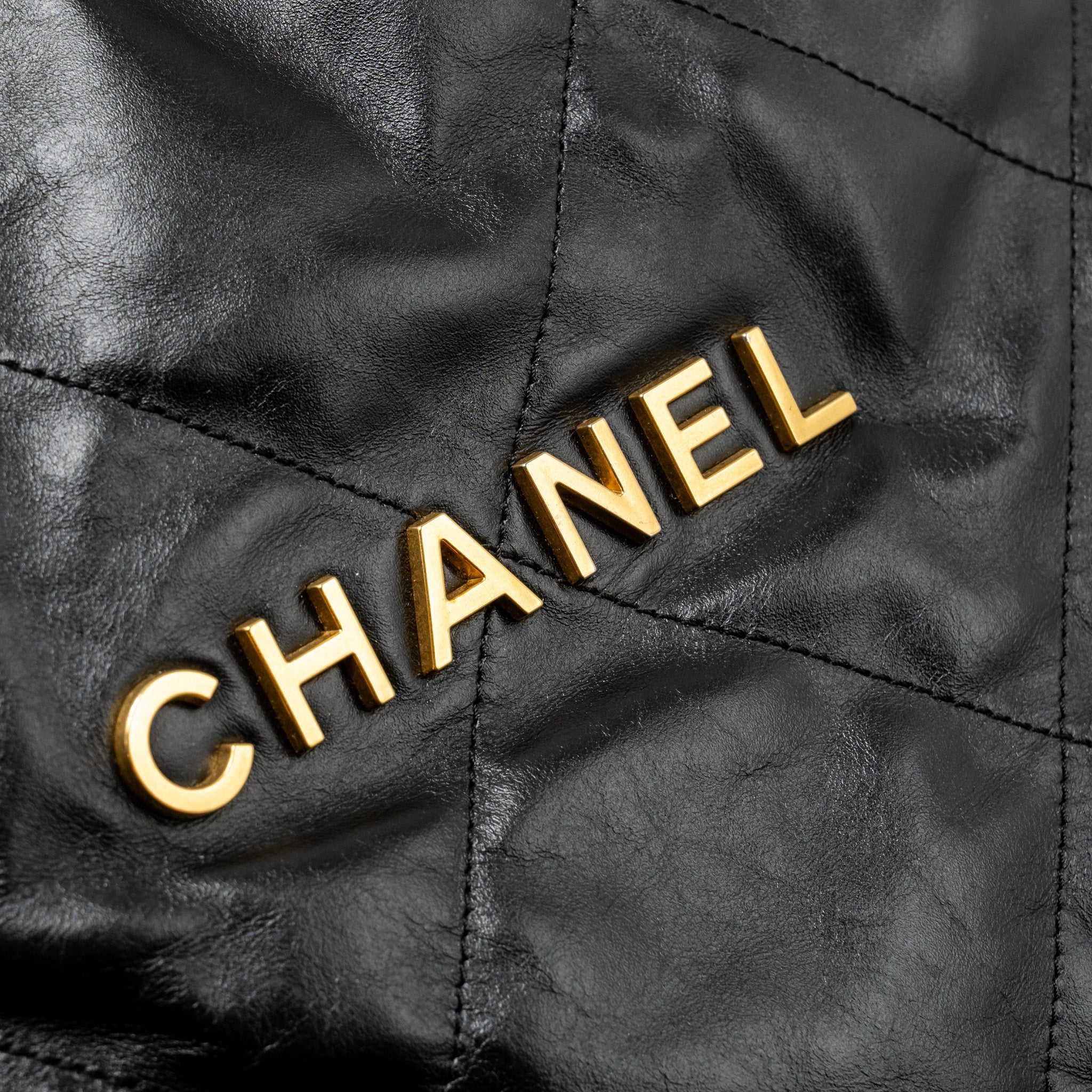 CHANEL SMALL 22 BAG GOLD LETTER CALFSKIN BLACK GHW (MICROCHIP)