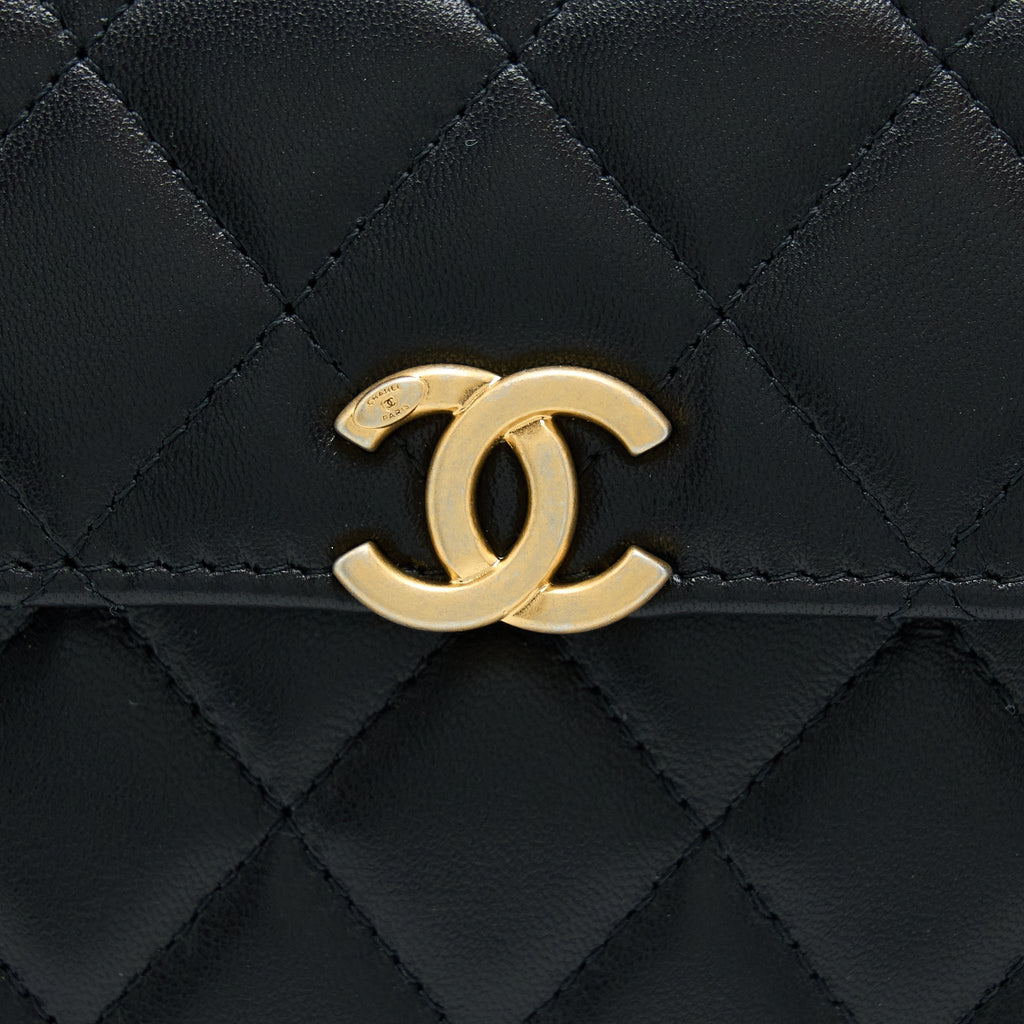 CHANEL 22B FLAP BAG WITH ENAMEL/CC LOGO TOP HANDLE LAMBSKIN BLACK BRUSHED GHW