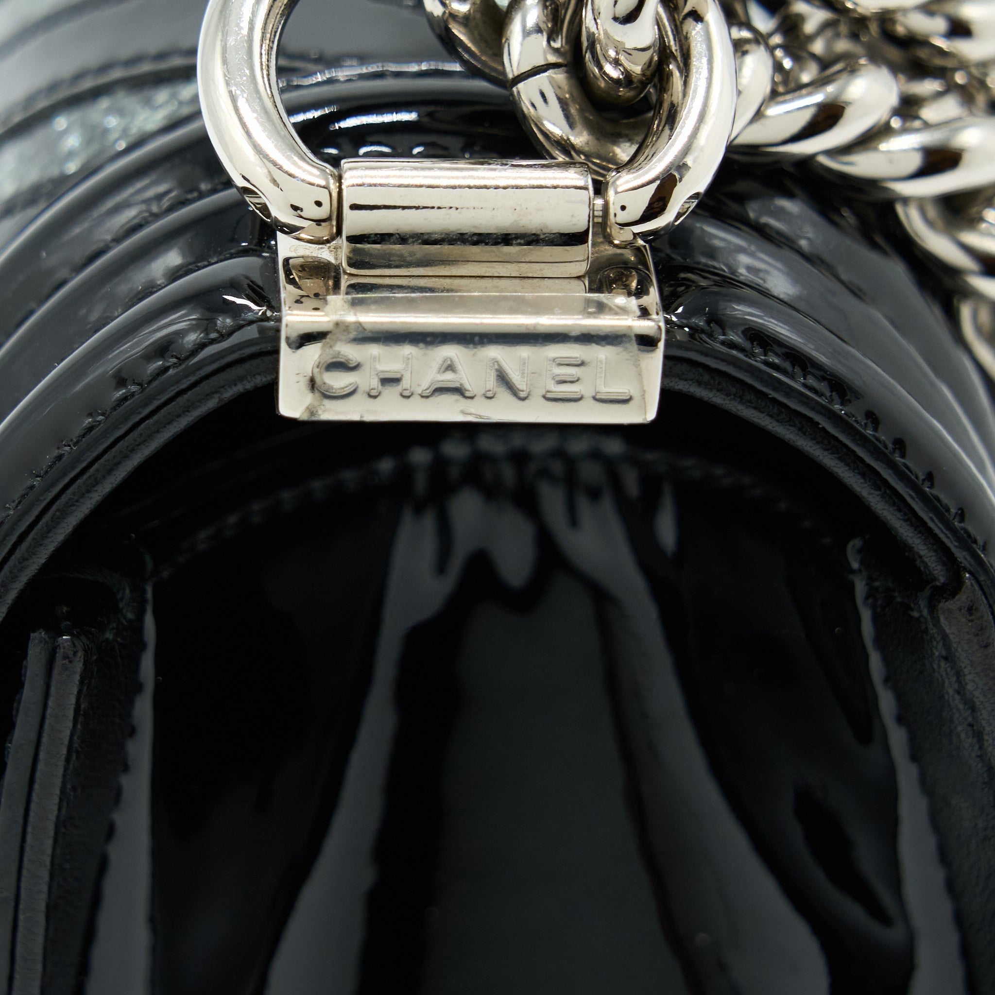 CHANEL MEDIUM BOY BAG CHEVRON LIMITED PATENT BLACK SHW