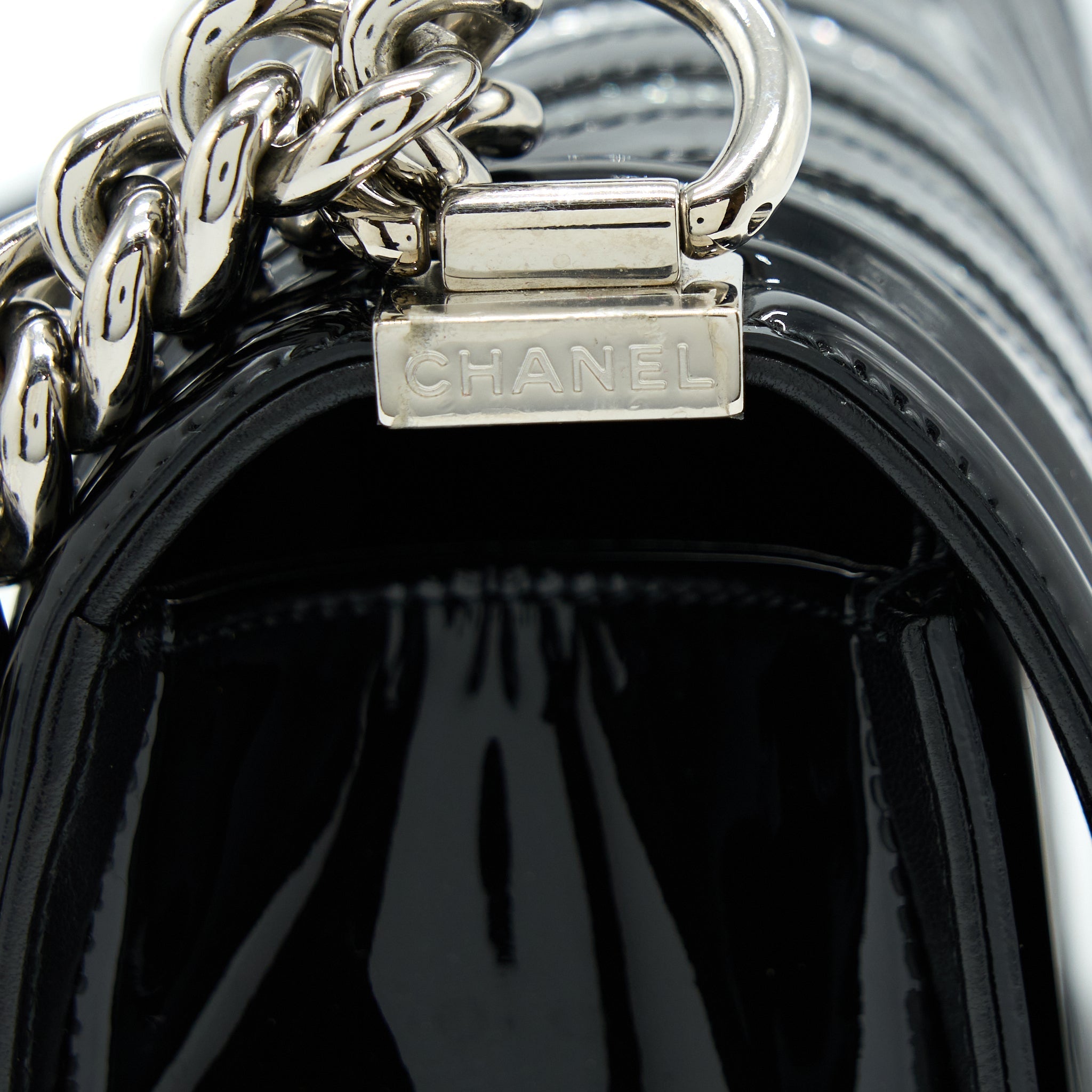 CHANEL MEDIUM BOY BAG CHEVRON LIMITED PATENT BLACK SHW