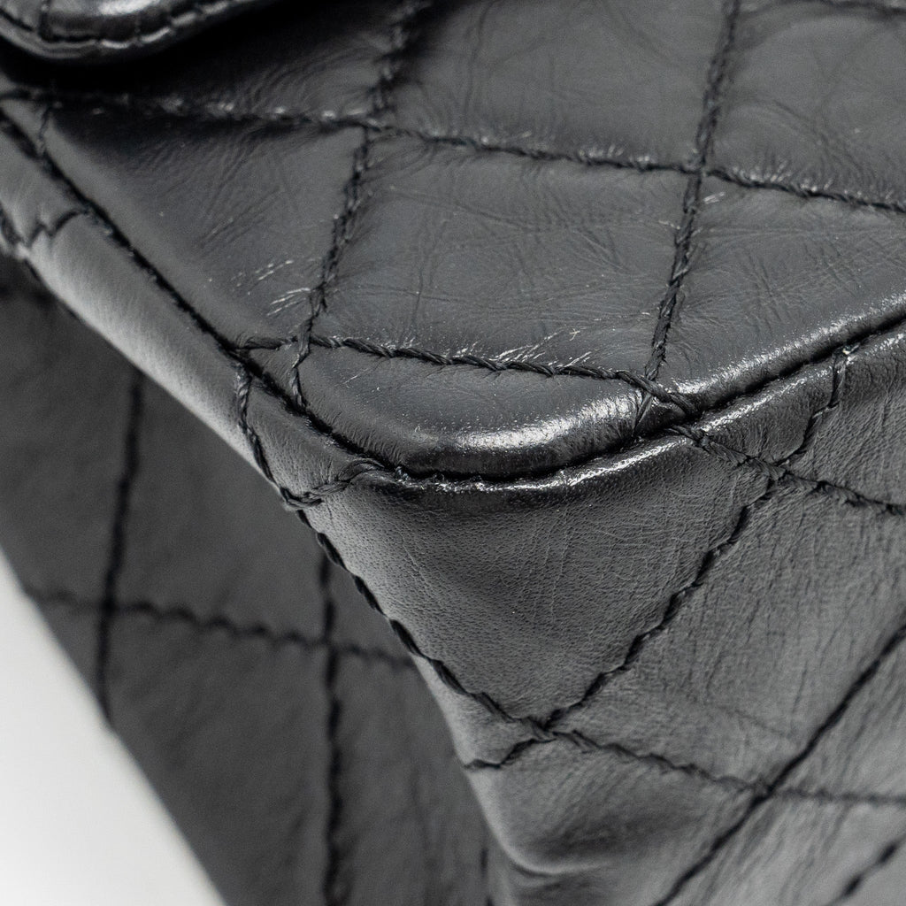 CHANEL MINI 2.55 REISSUE FLAP BAG AGED CALFSKIN BLACK GHW